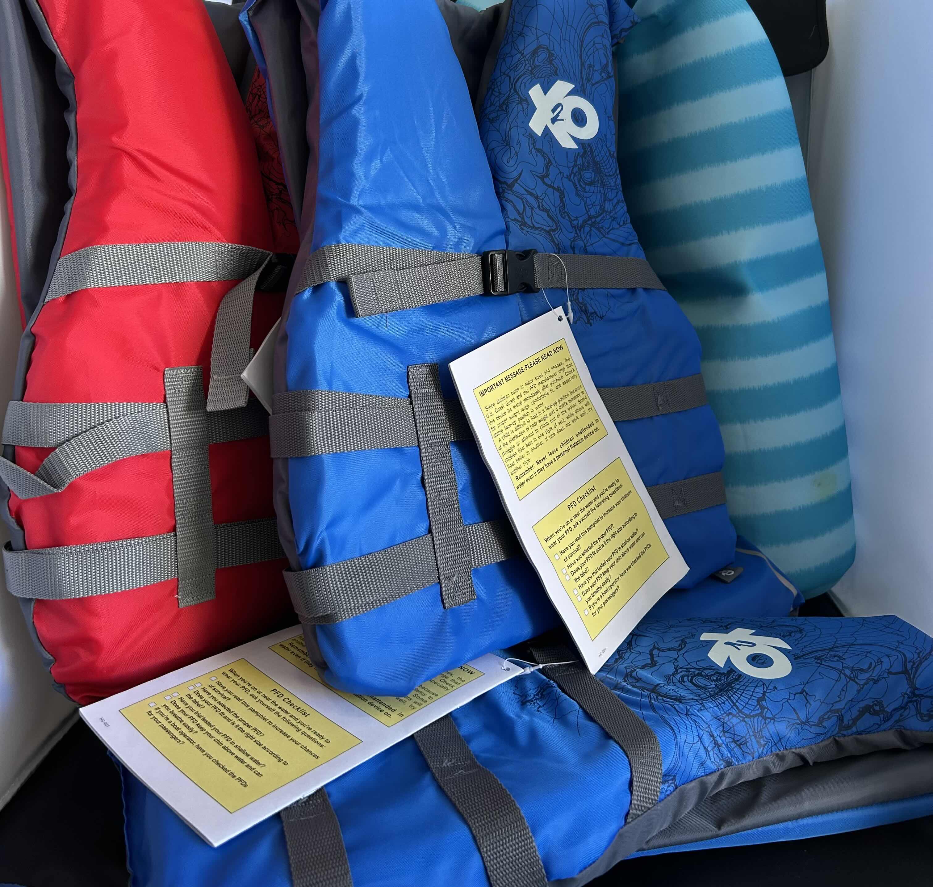 Photo 1 of 3 - X2O ADULT LIFE JACKETS WITH CARRY CASE AND 1 MEMBERS MARK MESH HAMMOCK POOL FLOAT BLUE STRIPES