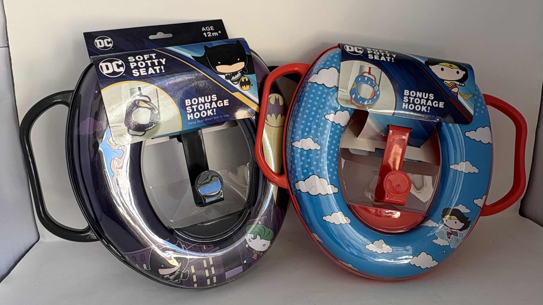 Photo 1 of 2 - BRAND NEW - DC COMICS KIDS POTTY TRAINING POTTY SEAT CUSHIONED WITH STORAGE HOOK, BATMAN POTTY SEAT, WONDER WOMAN POTTY SEAT FOR CHILDREN. 