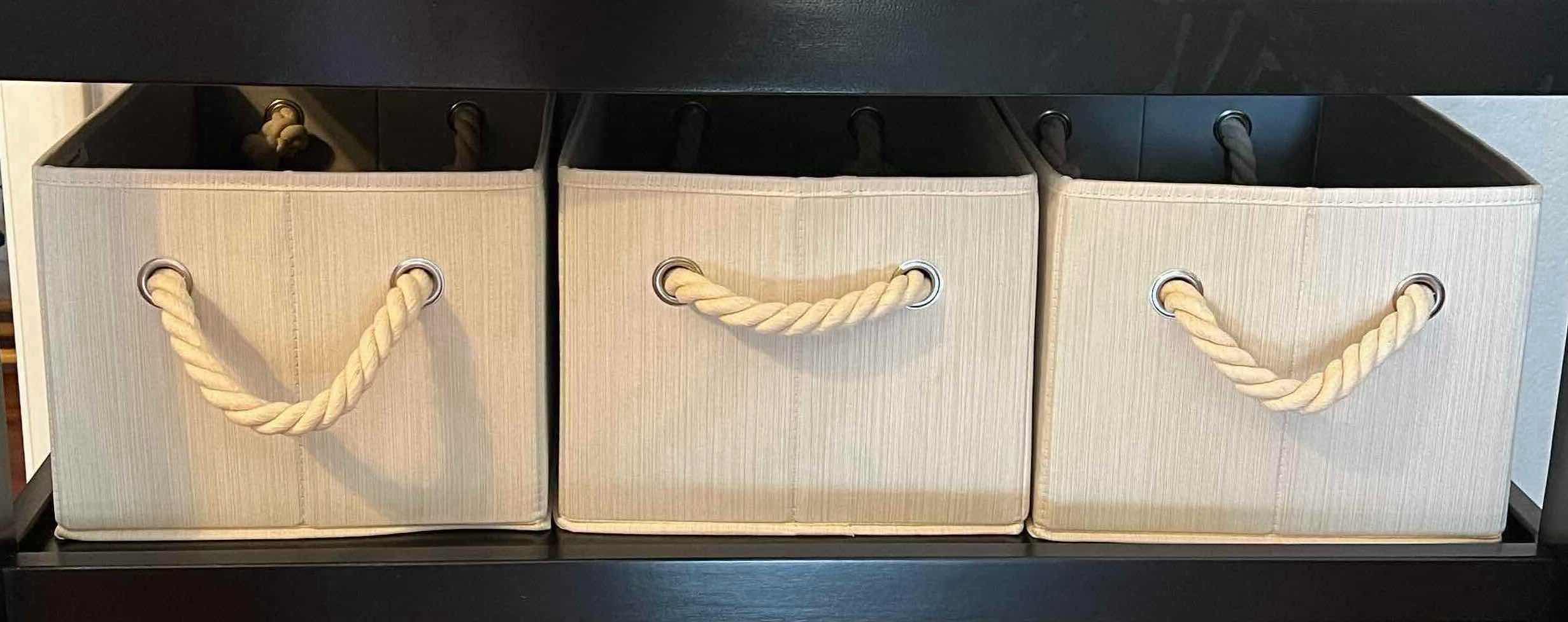 Photo 1 of 3-SET OF CANVAS DECORATIVE STORAGE BOXES. 15”L X 10”W X 8”H. GREIGE COLOR WITH NAUTICAL ROPE HANDLES ON BOTH ENDS. SUITABLE FOR CHANGING TABLES, BOOKCASES ETC.