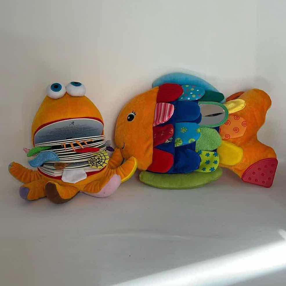 Photo 1 of BABY TOYS. LIKE NEW. PLUSH SENSORY TOYS/BOOK “OCTOBER THE OCTOPUS”