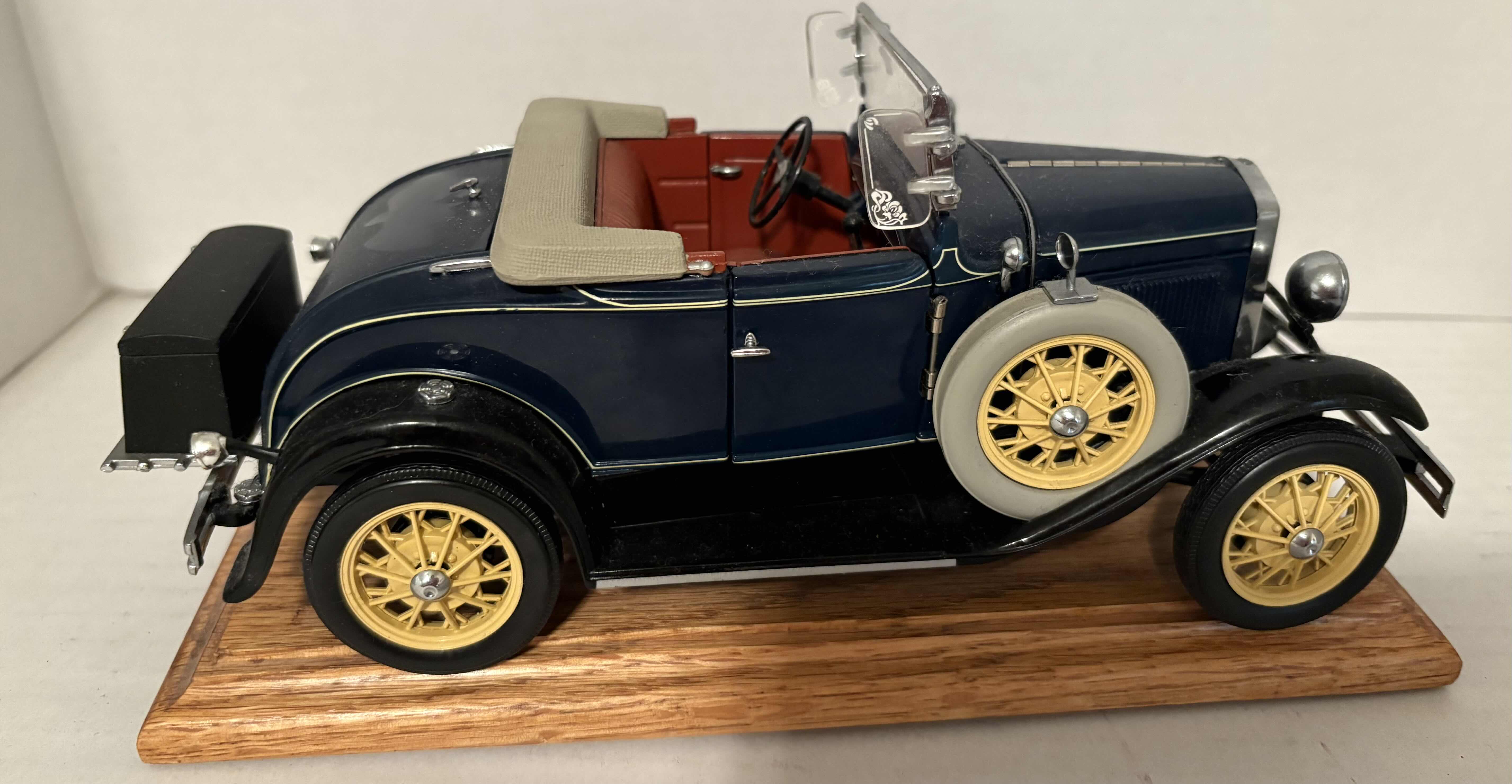 Photo 1 of 1999 MOTORCITY CLASSICS 1/18 SCALE ‘31 MODEL A CAR WITH MOVING PARTS AND WOODEN STAND