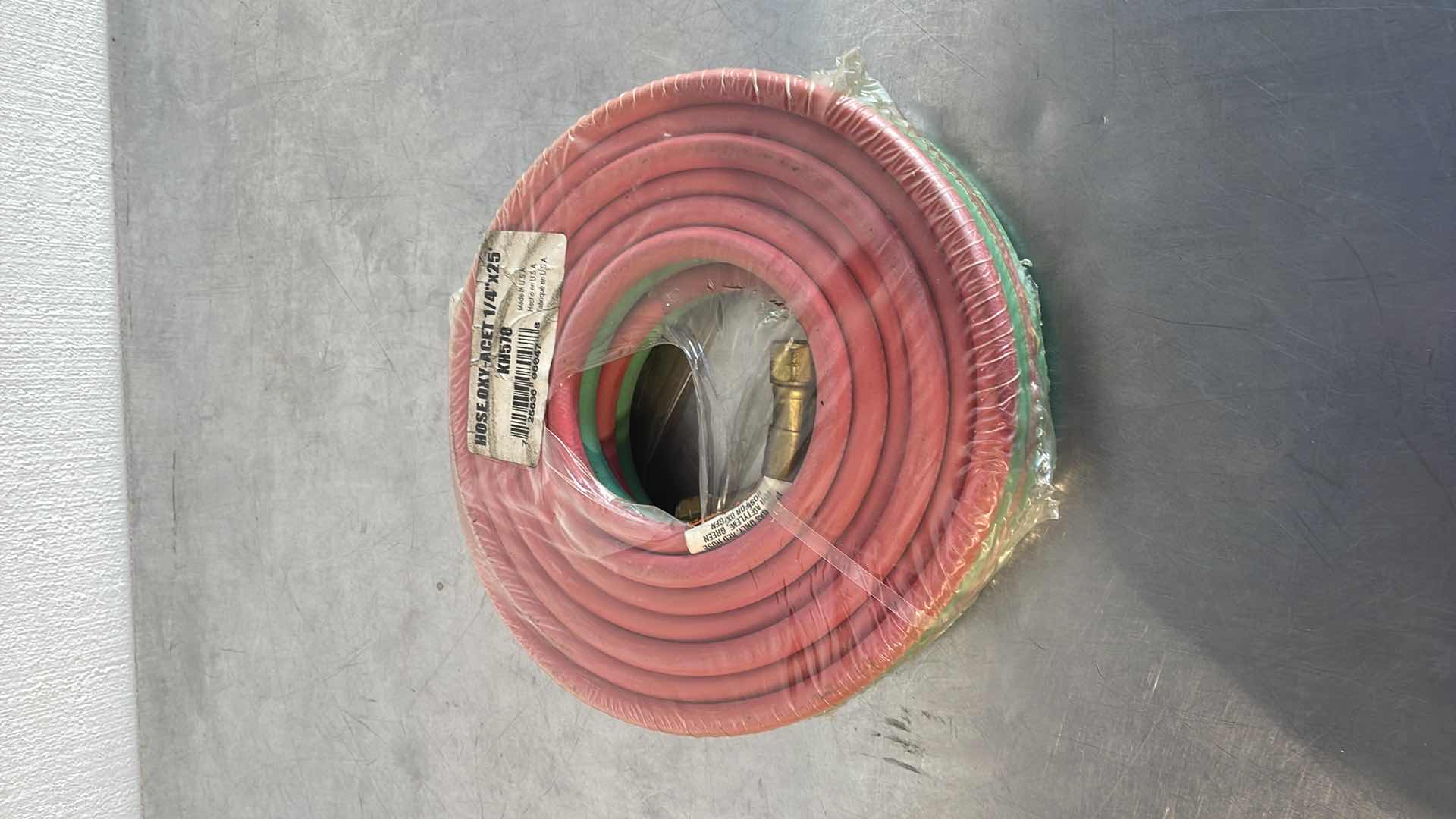 Photo 1 of LINCOLN ELECTRIC OXY-ACETYLENE HOSE — 1/4IN. DIA. X 25FT.L, 100 PSI, MODEL# KH578