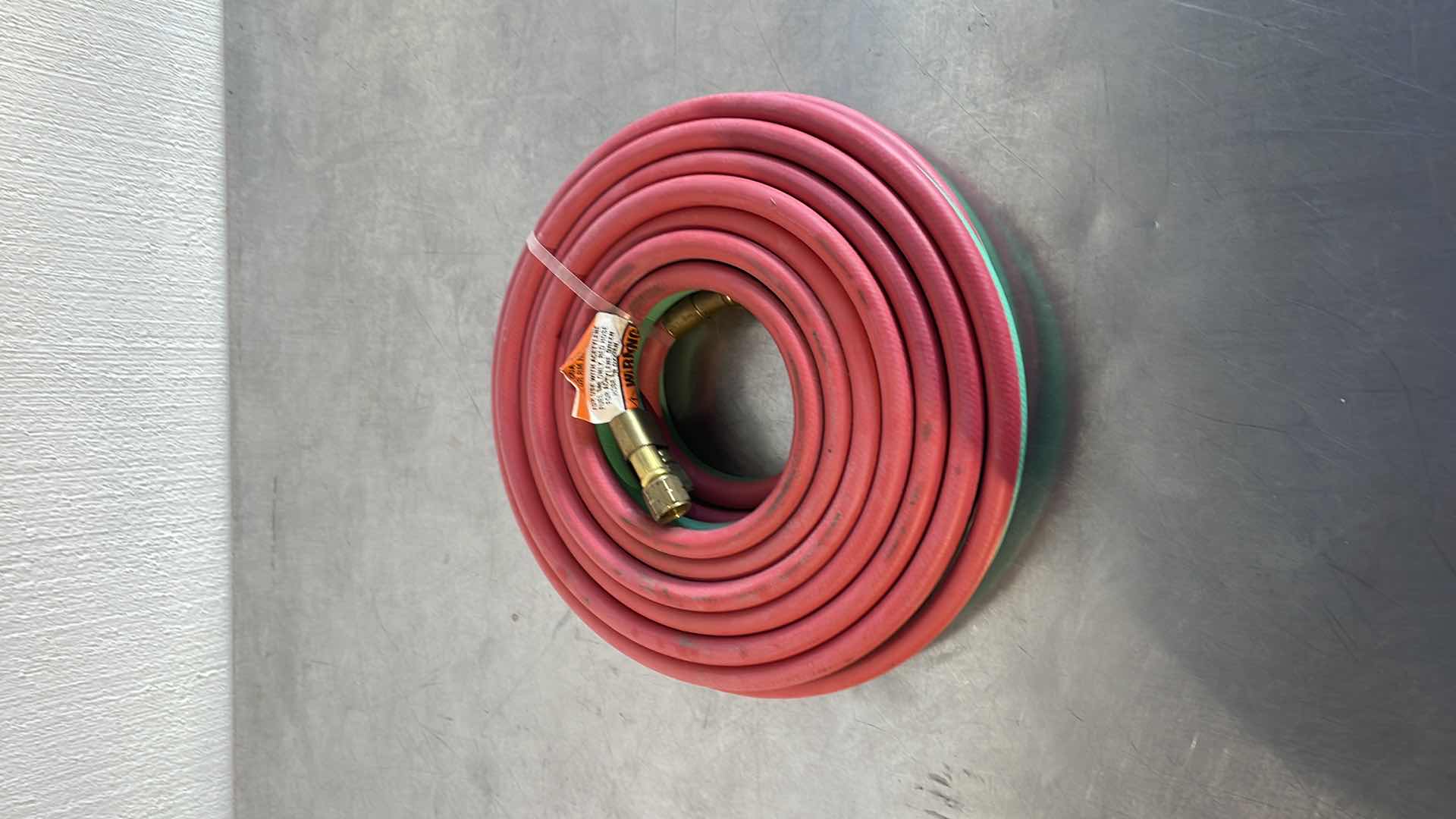 Photo 1 of LINCOLN ELECTRIC OXY-ACETYLENE HOSE — 1/4IN. DIA. X 25FT.L, 100 PSI, MODEL# KH578