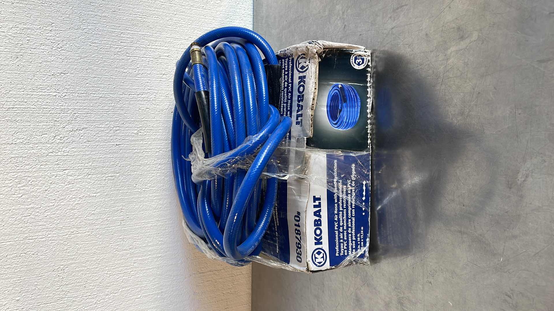 Photo 2 of KOBALT PVC AIR HOSE 3/8” X 50’ IN BOX AND USED ONE ON TOP (100’ TOTAL)