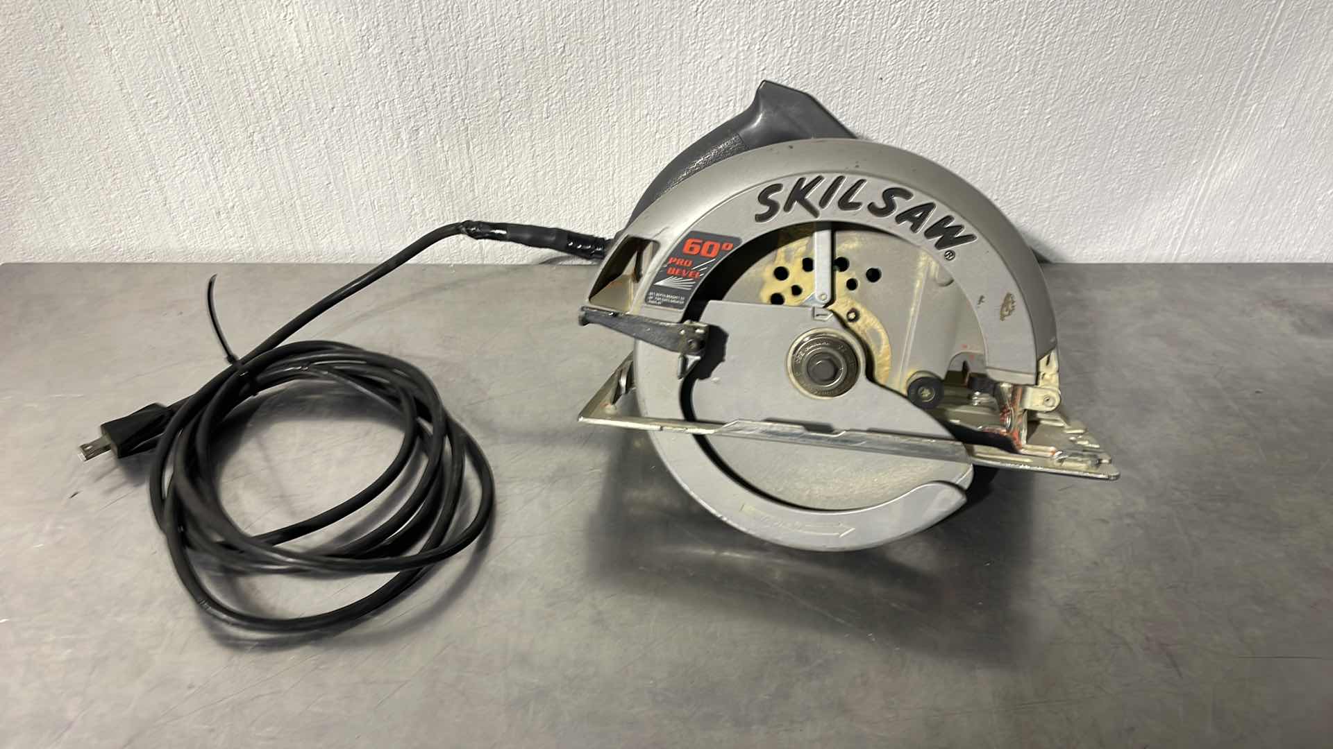 Photo 1 of SKILSAW 8-1/4” HEAVY DUTY CIRCULAR SAW HD5660 TAPE ON CORD AS PICTURED TESTED NEEDS BLADE