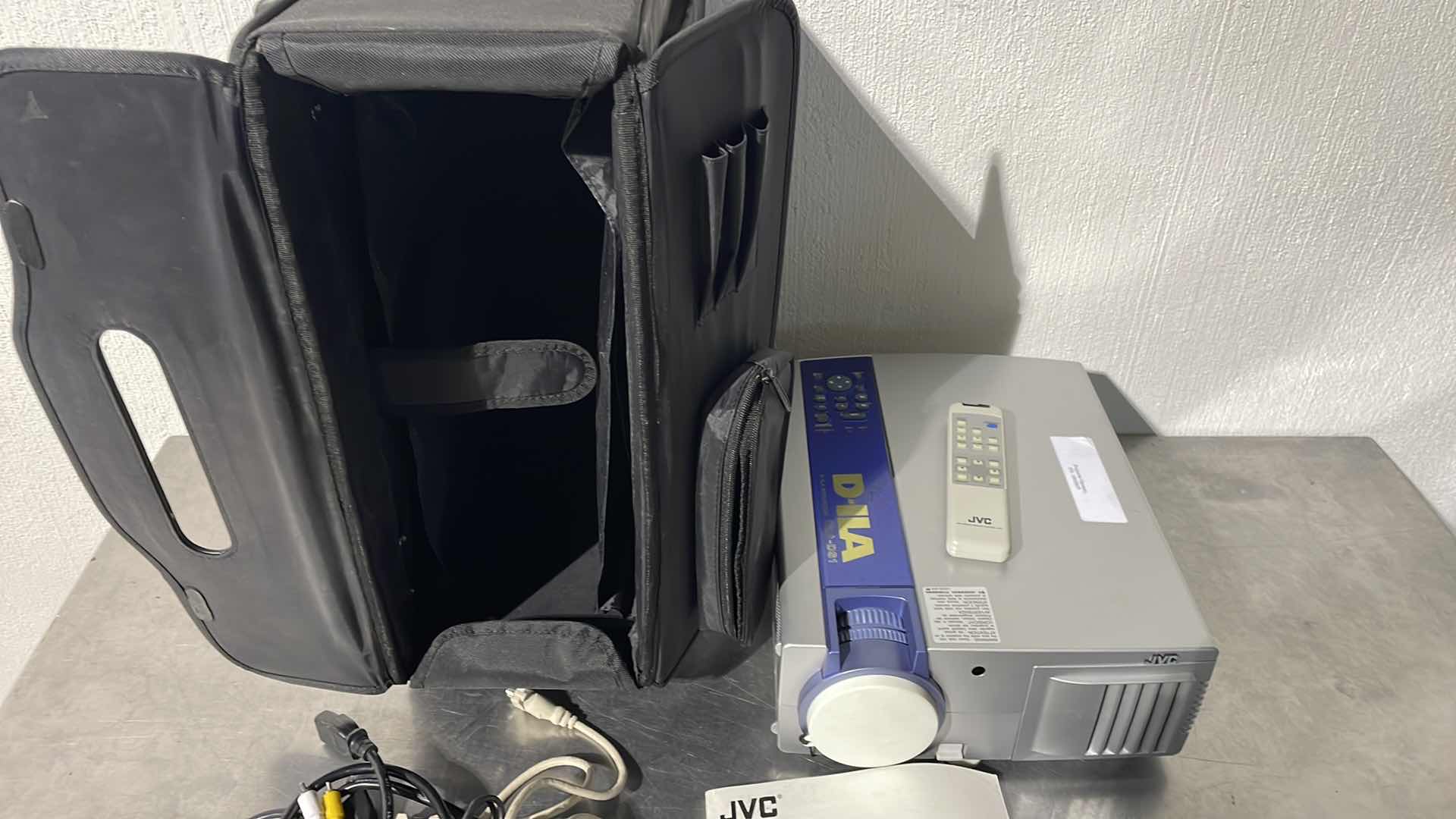 Photo 3 of JVC DLA-DS1U PROJECTOR WITH ROLLING CASE UNKNOWN COMBINATION TO ROLLER CASE