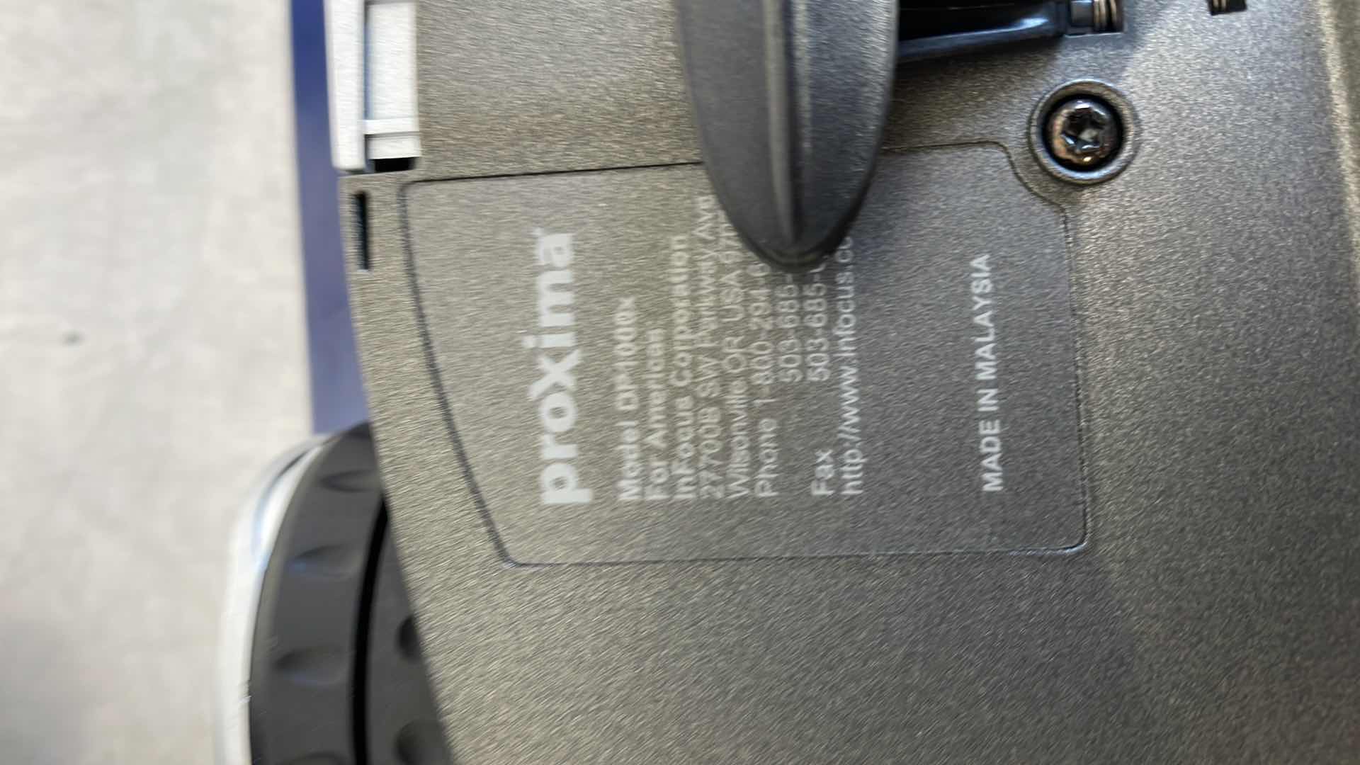 Photo 5 of PROXIMA DP1000 X PROJECTOR REMOTE BROKEN