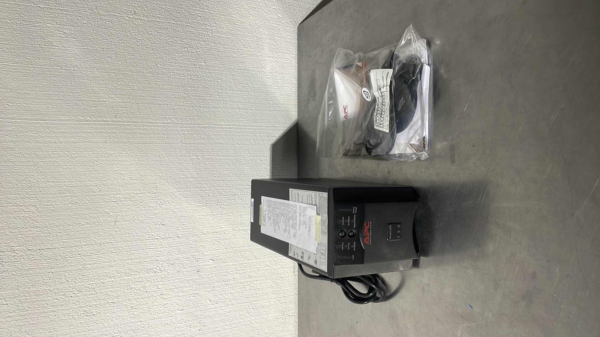 Photo 1 of APC SMART UPS UNINTERRUPTIBLE POWER SUPPLY 750