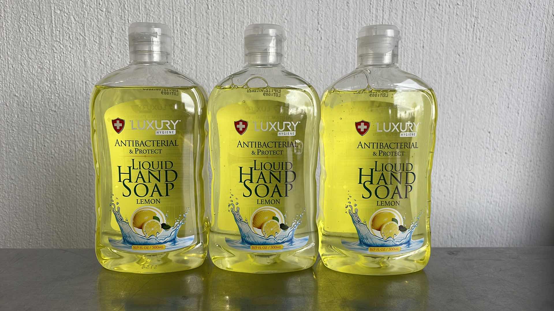 Photo 1 of LUXURY HYGIENE LEMON LIQUID HAND SOAP 3-16.9oz BOTTLES