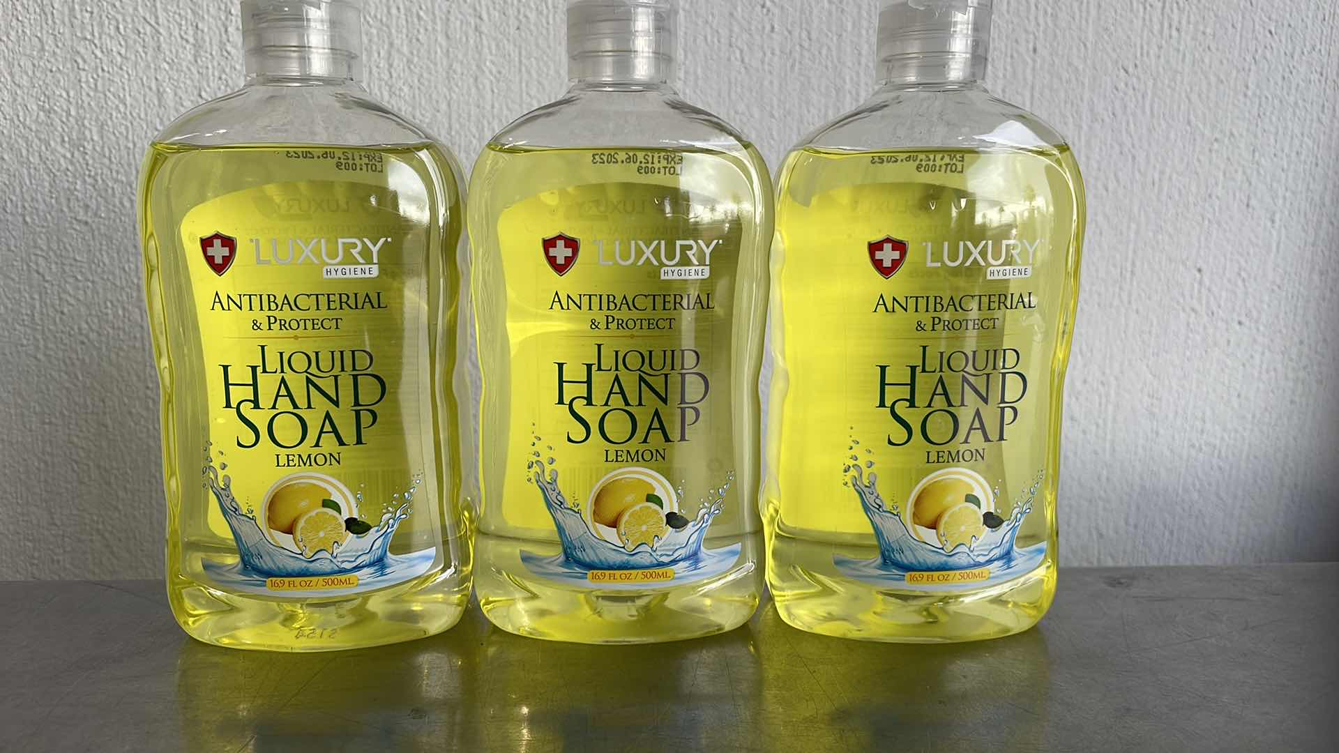 Photo 1 of LUXURY HYGIENE LEMON LIQUID HAND SOAP 3-16.9oz BOTTLES