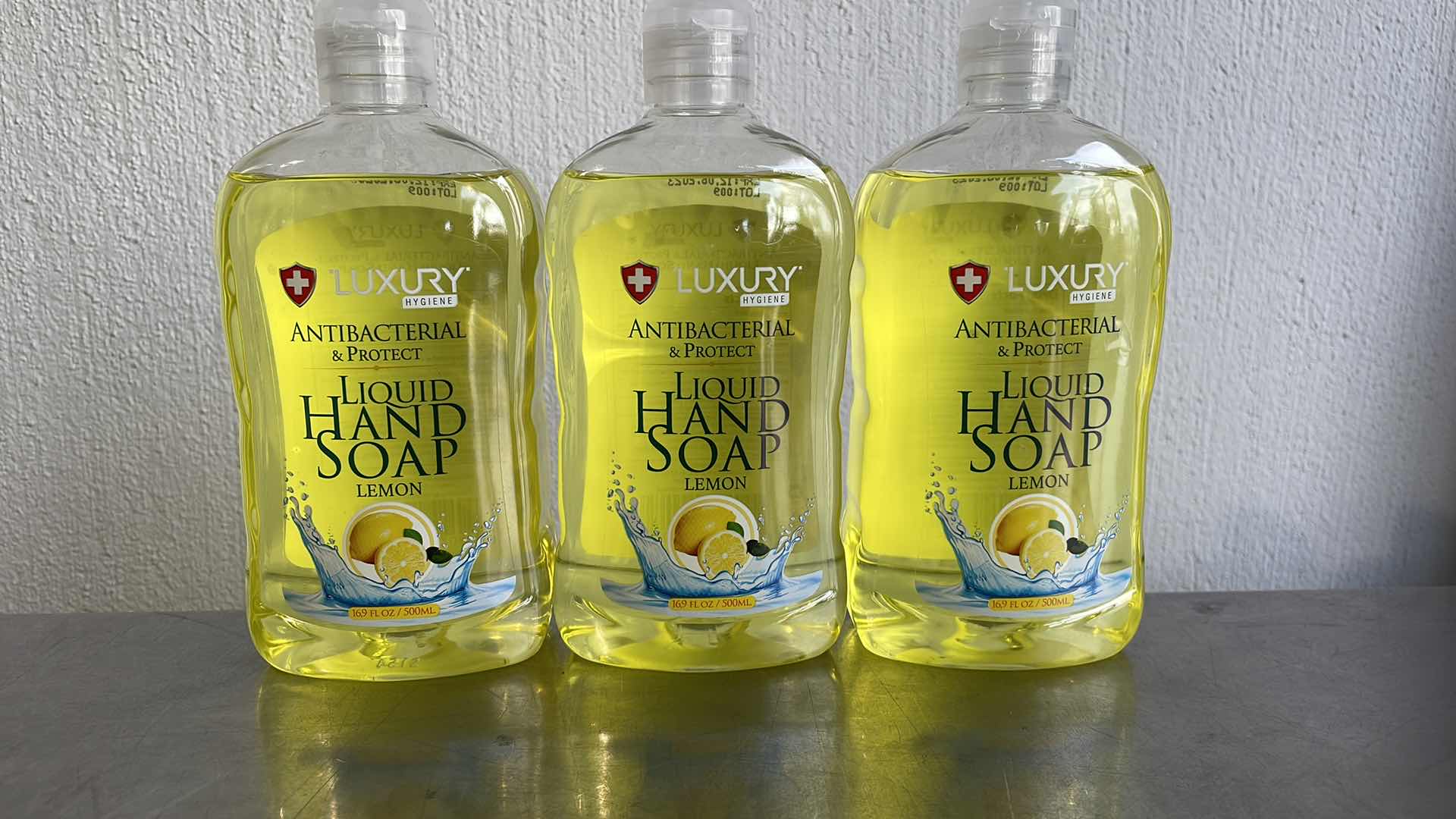 Photo 1 of LUXURY HYGIENE LEMON LIQUID HAND SOAP 3-16.9oz BOTTLES