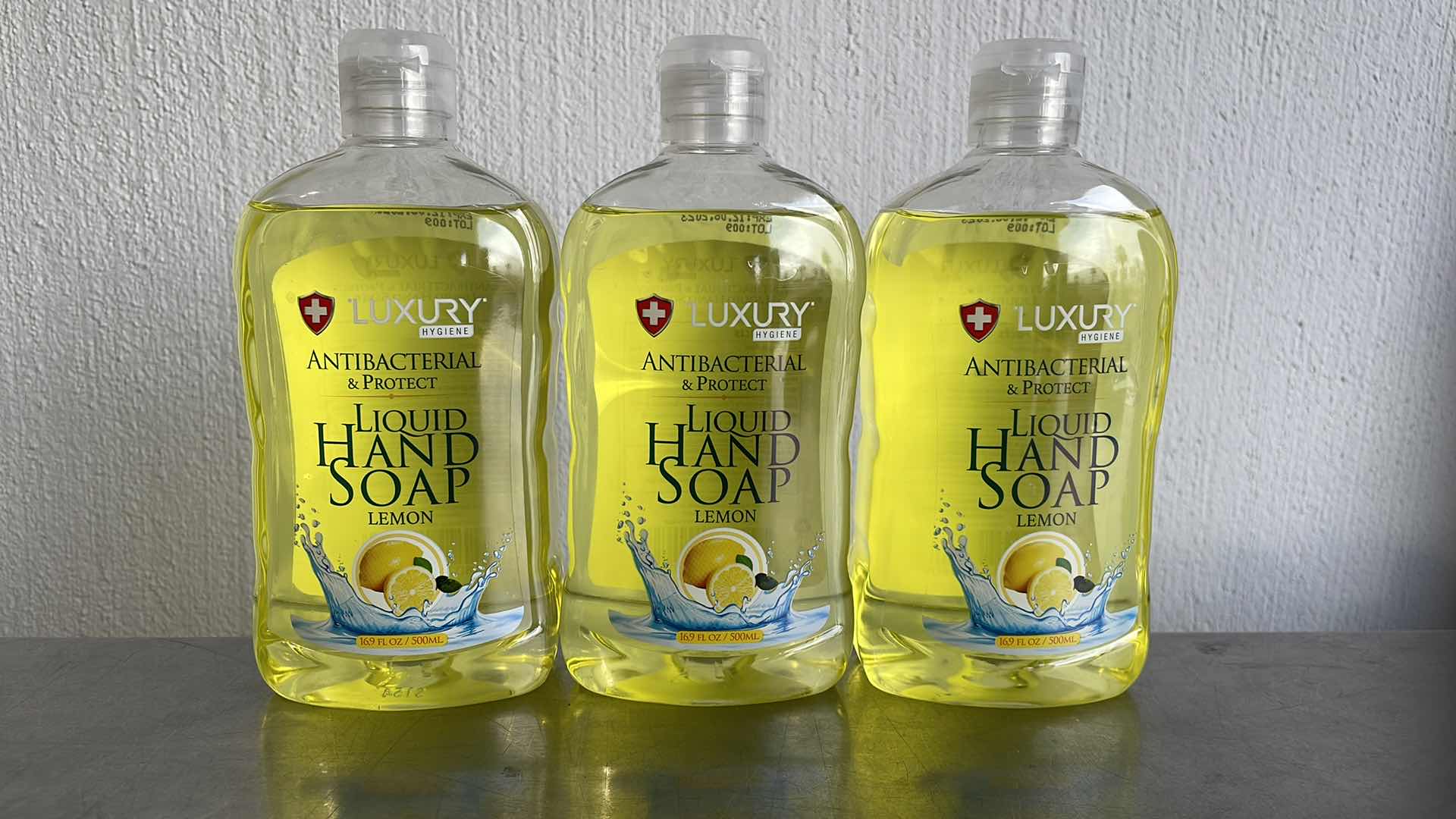 Photo 1 of LUXURY HYGIENE LEMON LIQUID HAND SOAP 3-16.9oz BOTTLES