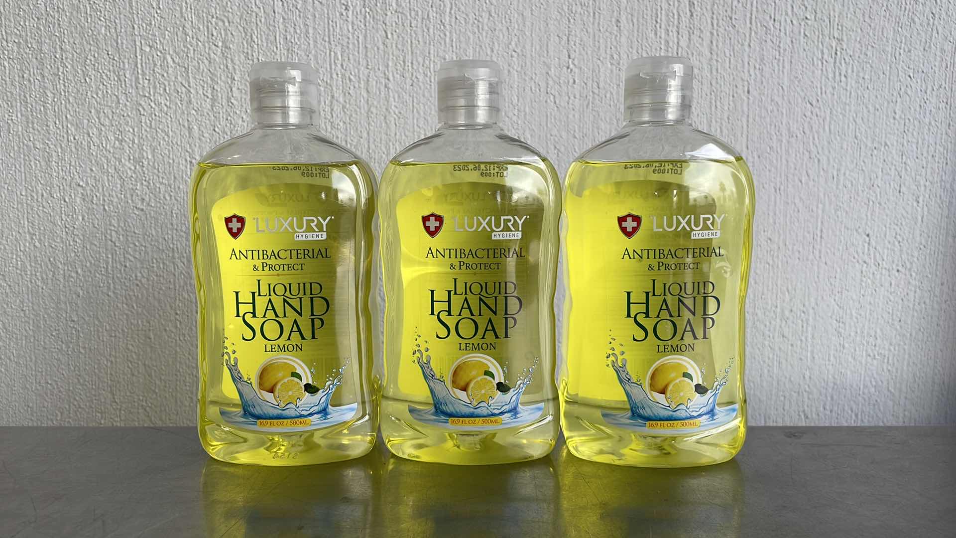 Photo 1 of LUXURY HYGIENE LEMON LIQUID HAND SOAP 3-16.9oz BOTTLES