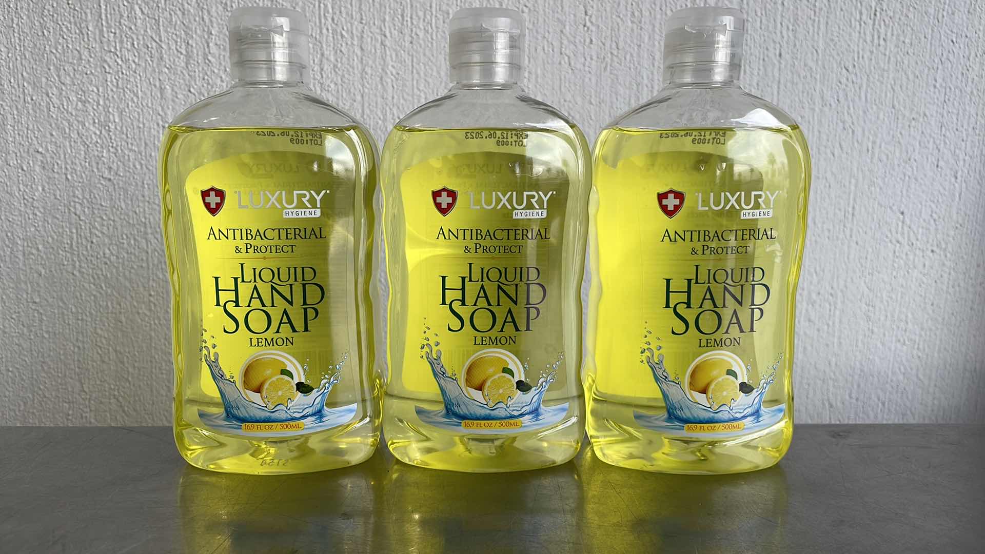 Photo 1 of LUXURY HYGIENE LEMON LIQUID HAND SOAP 3-16.9oz BOTTLES