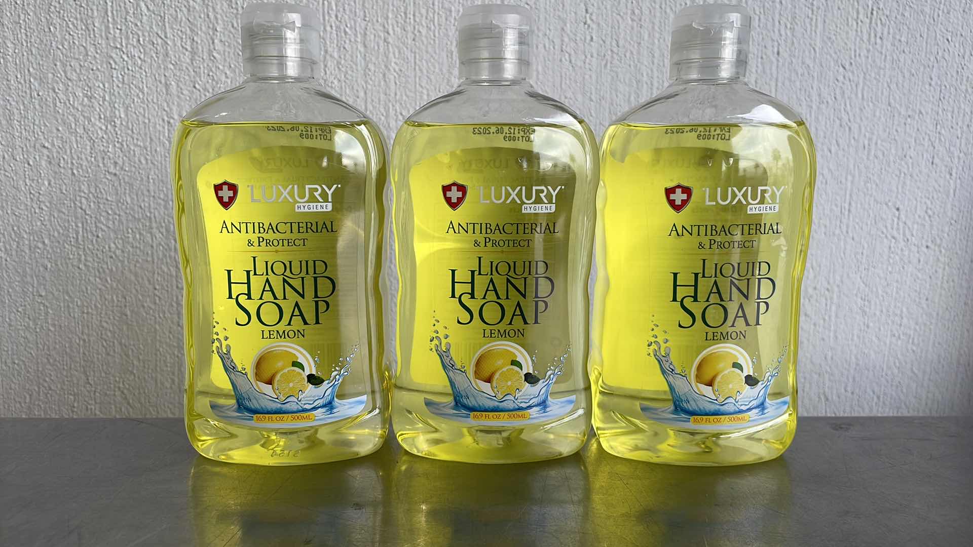 Photo 1 of LUXURY HYGIENE LEMON LIQUID HAND SOAP 3-16.9oz BOTTLES