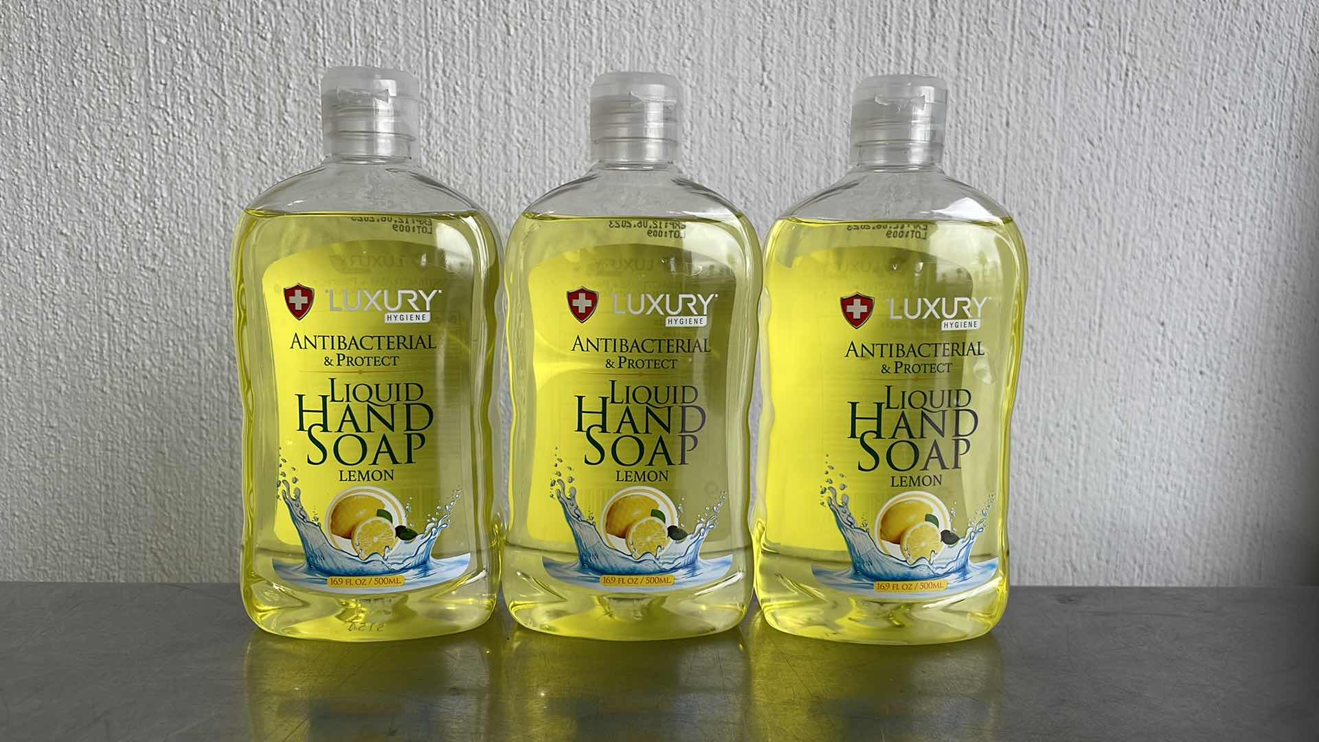 Photo 1 of LUXURY HYGIENE LEMON LIQUID HAND SOAP 3-16.9oz BOTTLES