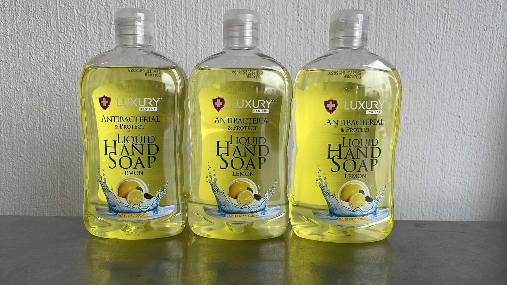 Photo 1 of LUXURY HYGIENE LEMON LIQUID HAND SOAP 3-16.9oz BOTTLES