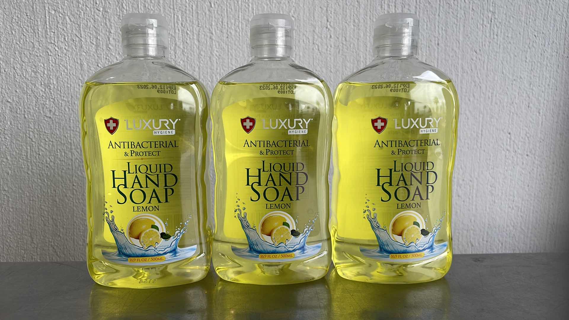 Photo 1 of LUXURY HYGIENE LEMON LIQUID HAND SOAP 3-16.9oz BOTTLES