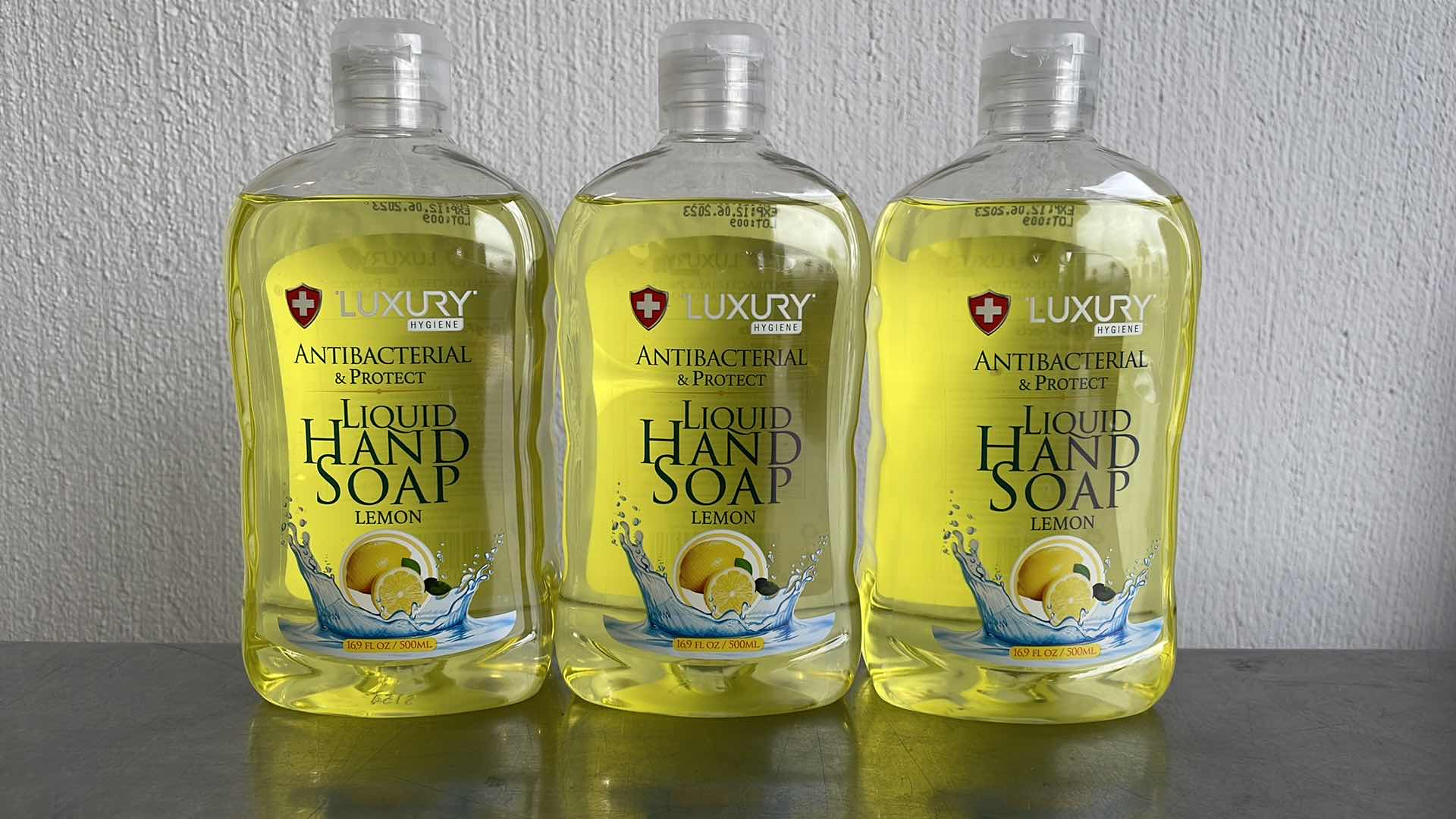 Photo 1 of LUXURY HYGIENE LEMON LIQUID HAND SOAP 3-16.9oz BOTTLES