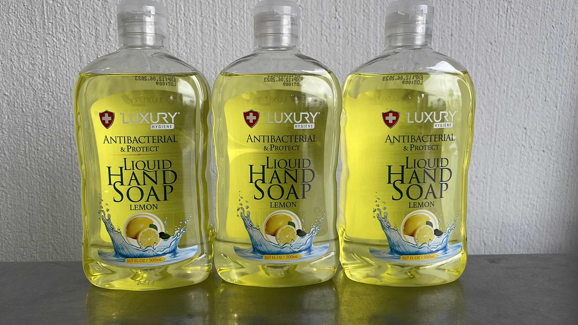 Photo 1 of LUXURY HYGIENE LEMON LIQUID HAND SOAP 3-16.9oz BOTTLES