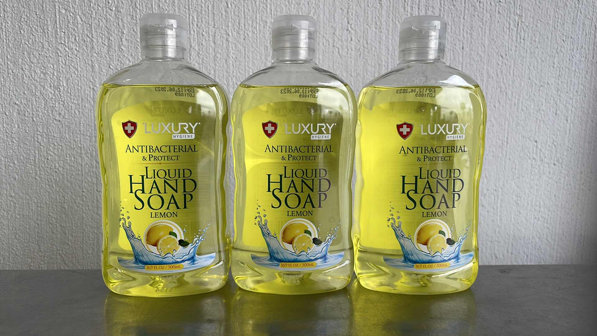 Photo 1 of LUXURY HYGIENE LEMON LIQUID HAND SOAP 3-16.9oz BOTTLES