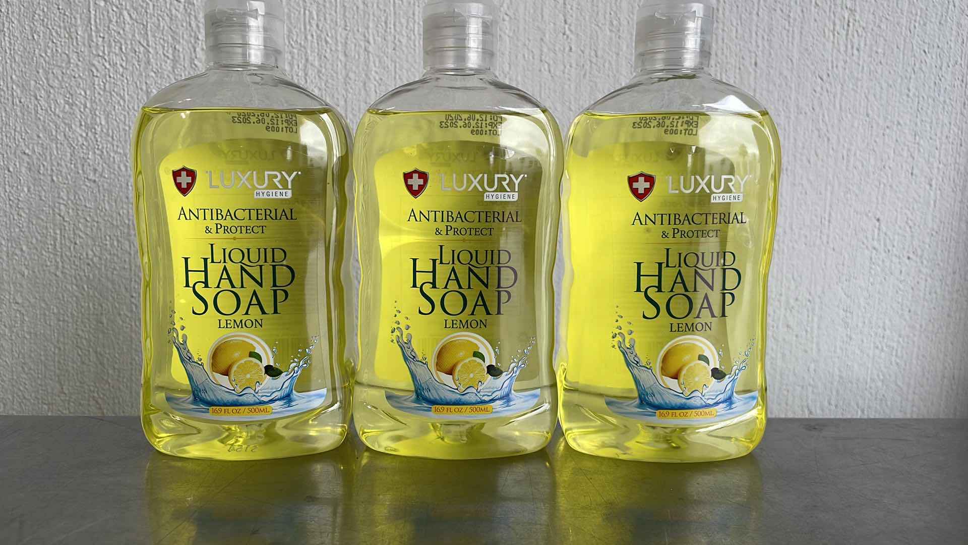 Photo 1 of LUXURY HYGIENE LEMON LIQUID HAND SOAP 3-16.9oz BOTTLES