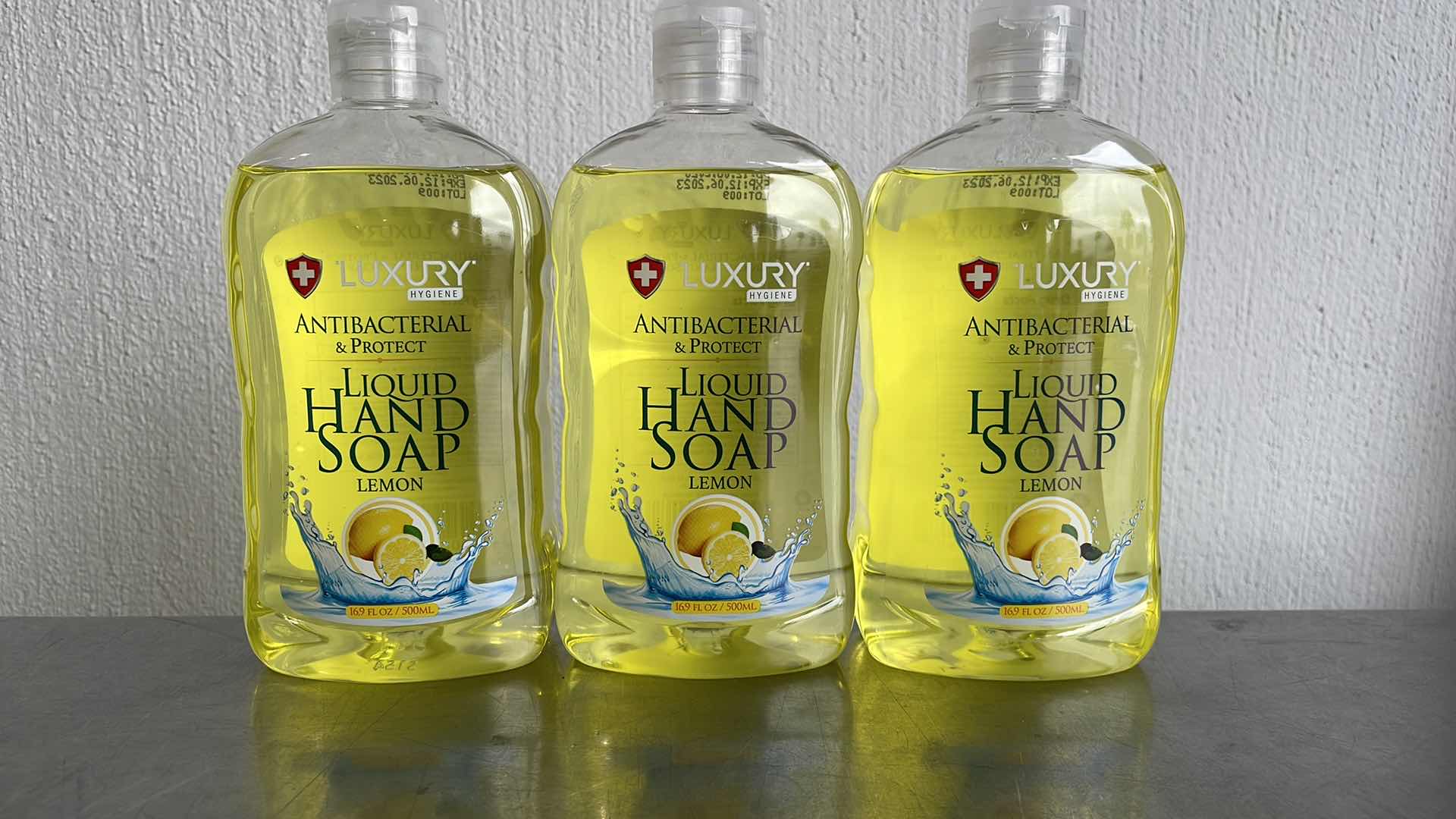 Photo 1 of LUXURY HYGIENE LEMON LIQUID HAND SOAP 3-16.9oz BOTTLES