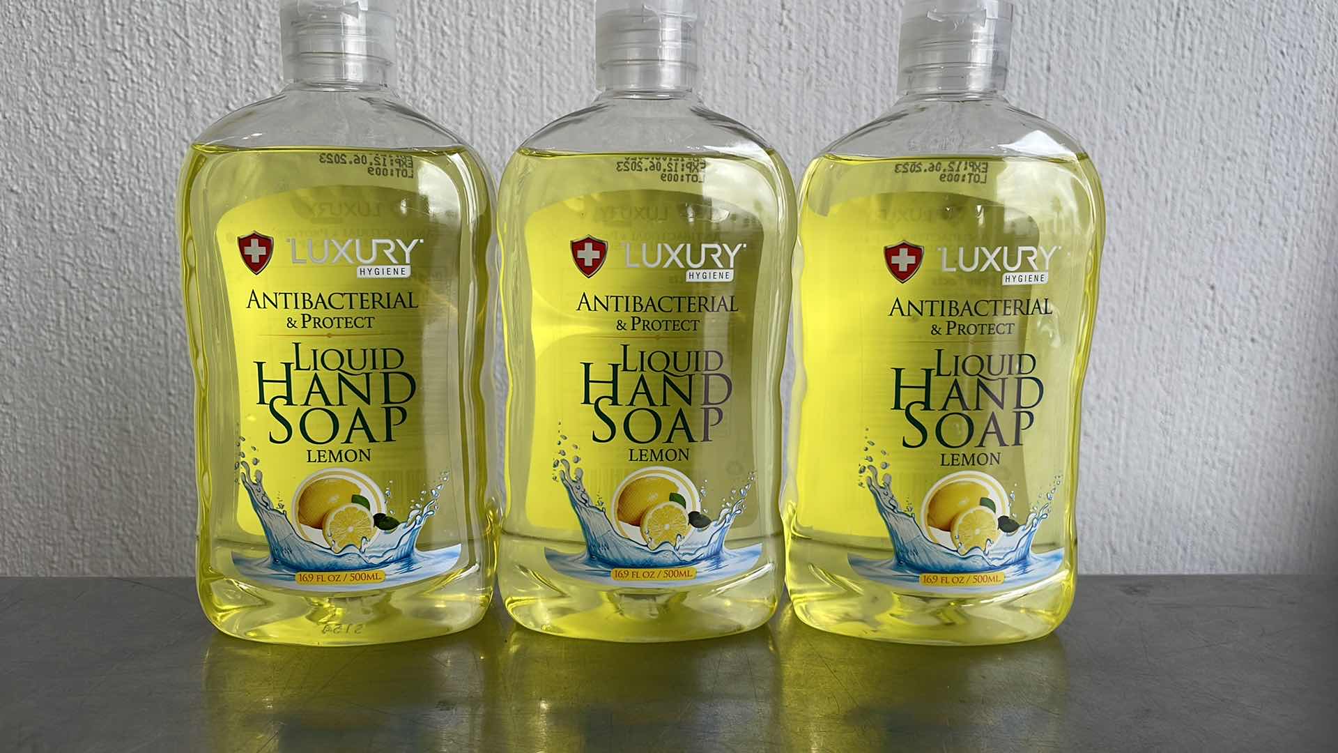 Photo 1 of LUXURY HYGIENE LEMON LIQUID HAND SOAP 3-16.9oz BOTTLES