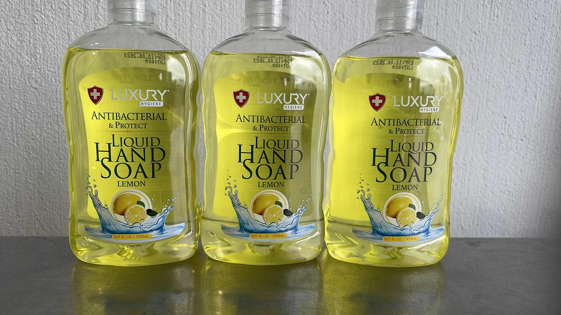 Photo 1 of LUXURY HYGIENE LEMON LIQUID HAND SOAP 3-16.9oz BOTTLES