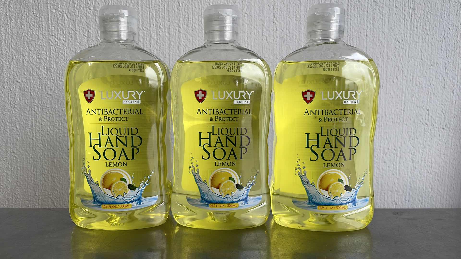 Photo 1 of LUXURY HYGIENE LEMON LIQUID HAND SOAP 3-16.9oz BOTTLES