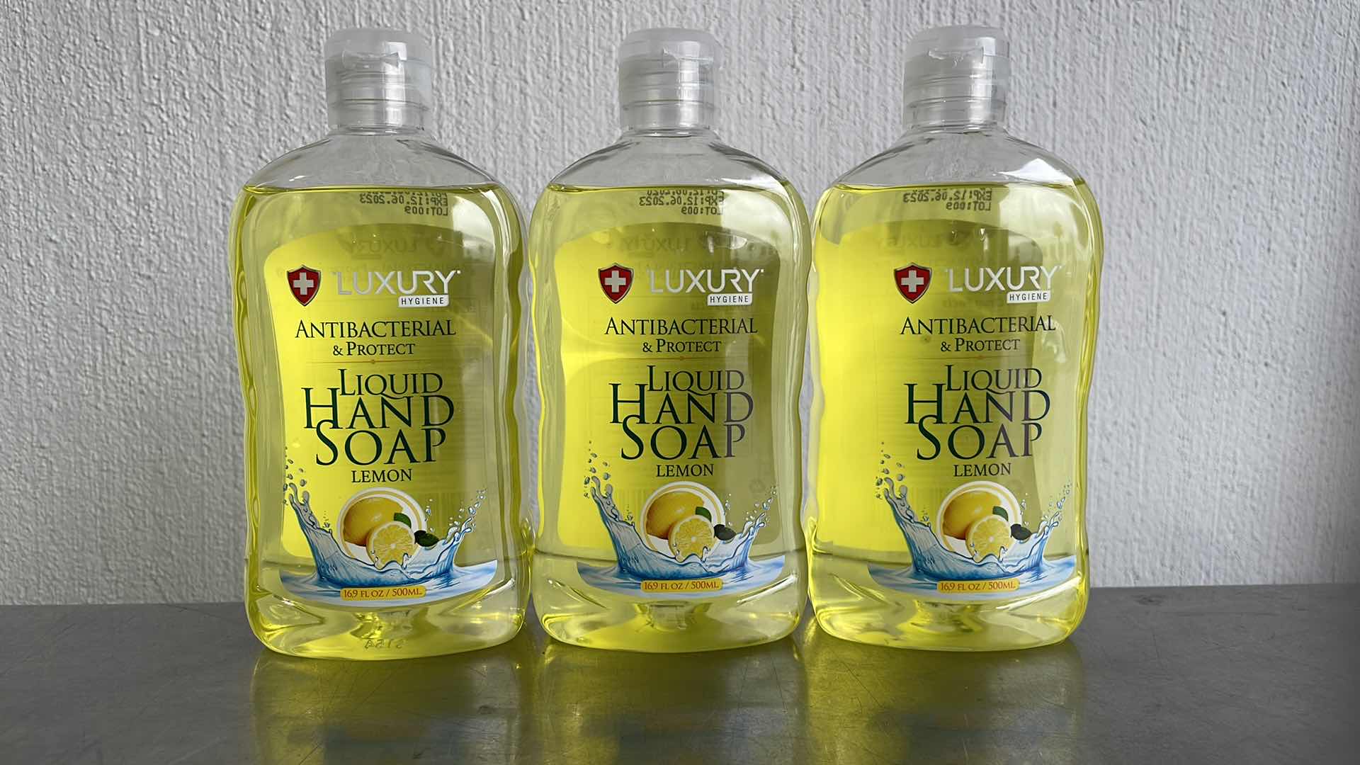 Photo 1 of LUXURY HYGIENE LEMON LIQUID HAND SOAP 3-16.9oz BOTTLES