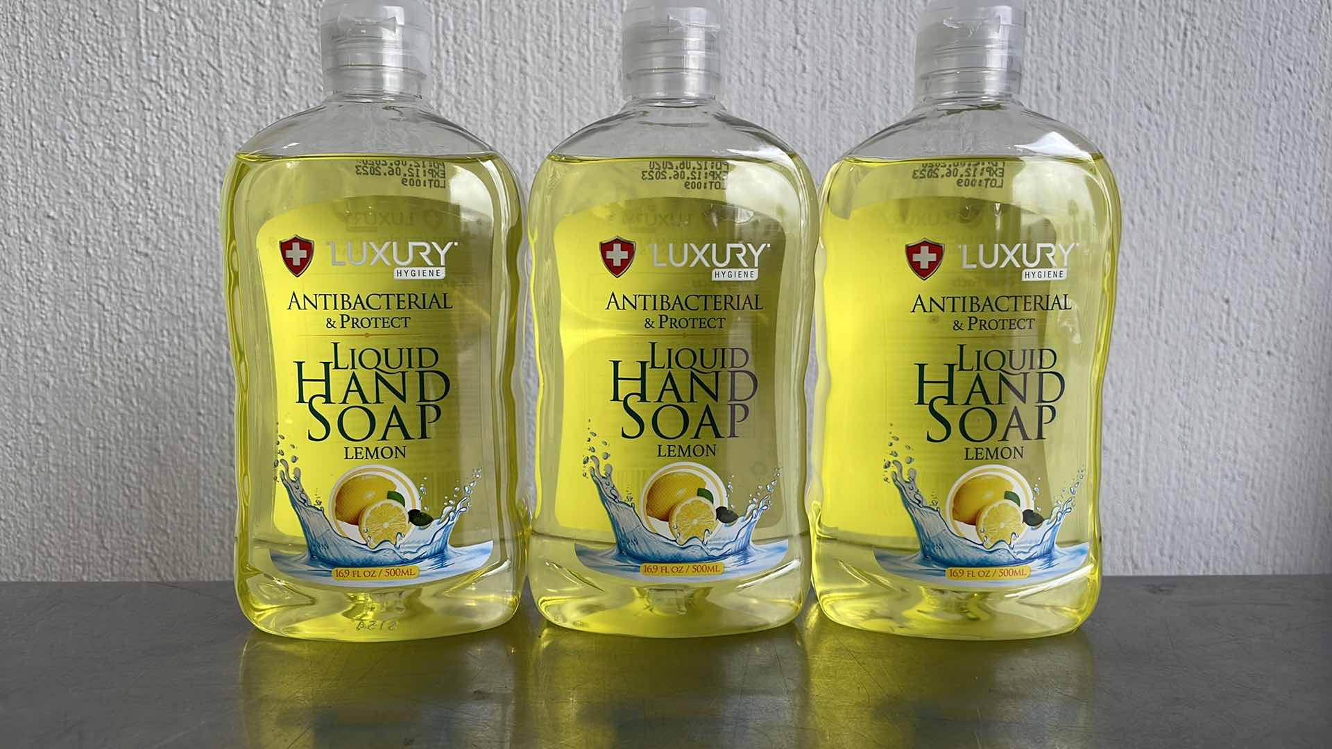 Photo 1 of LUXURY HYGIENE LEMON LIQUID HAND SOAP 3-16.9oz BOTTLES