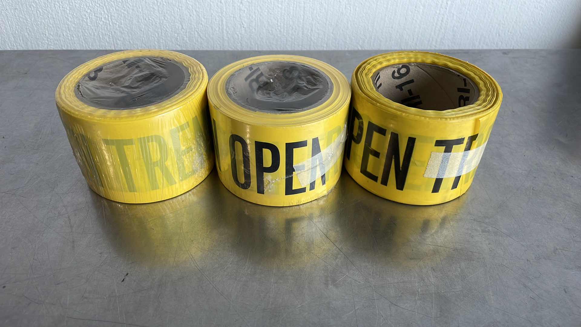 Photo 2 of CAUTION OPEN TRENCH BARRICADE TAPE 3” X 200’