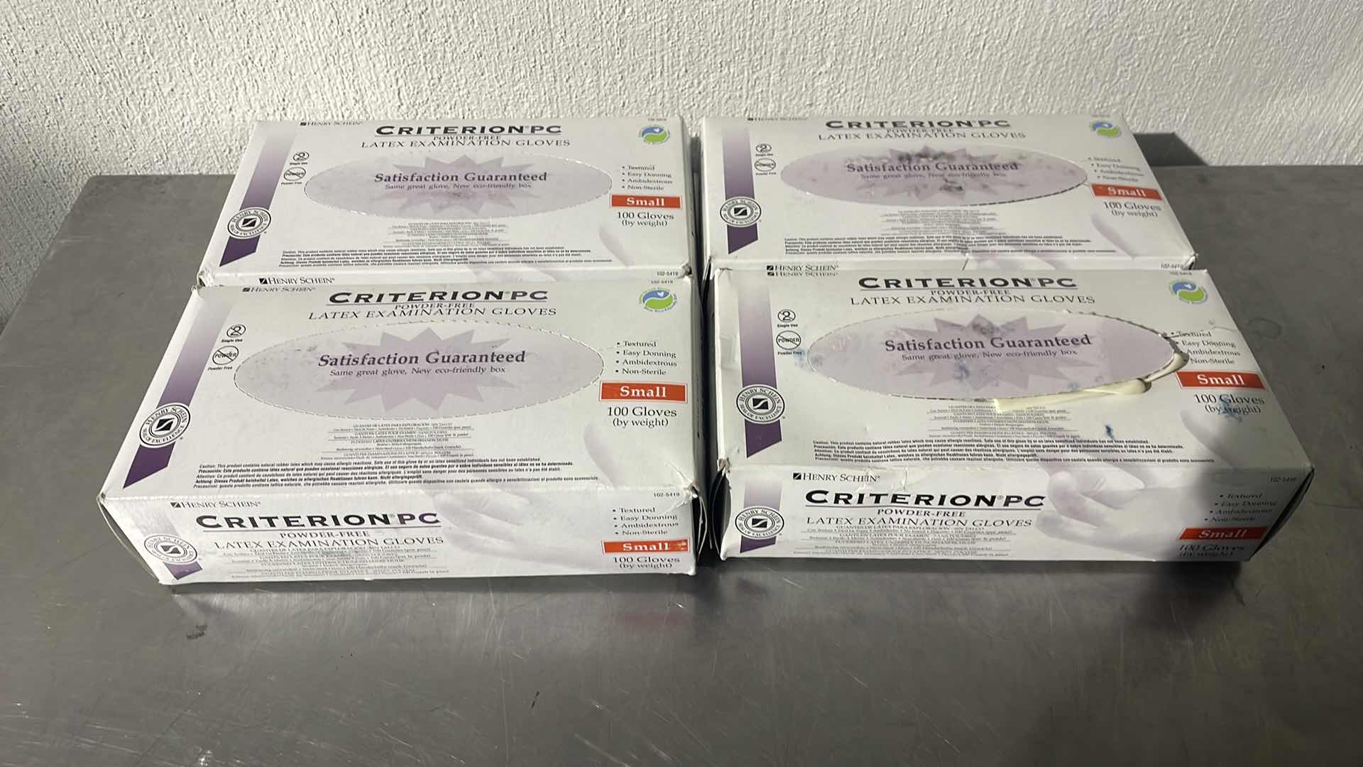 Photo 1 of CRITERION PC POWDER-FREE
LATEX EXAMINATION GLOVES SMALL (4) 2 BOXES ARE RIPPED AS PICTURED