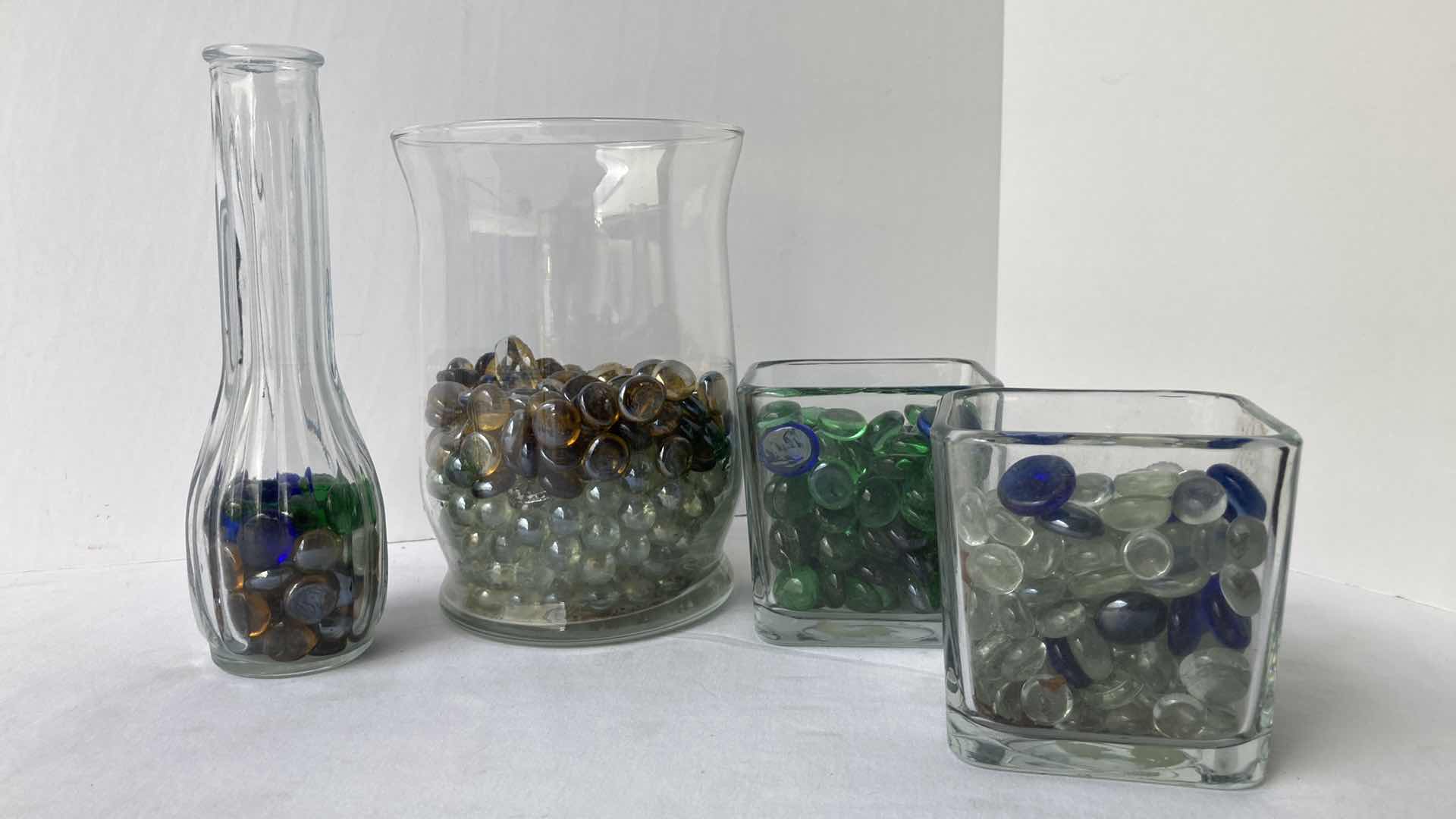 Photo 1 of CLEAR GLASS 9” VASE & JARS W MULTI COLOR MARBLES