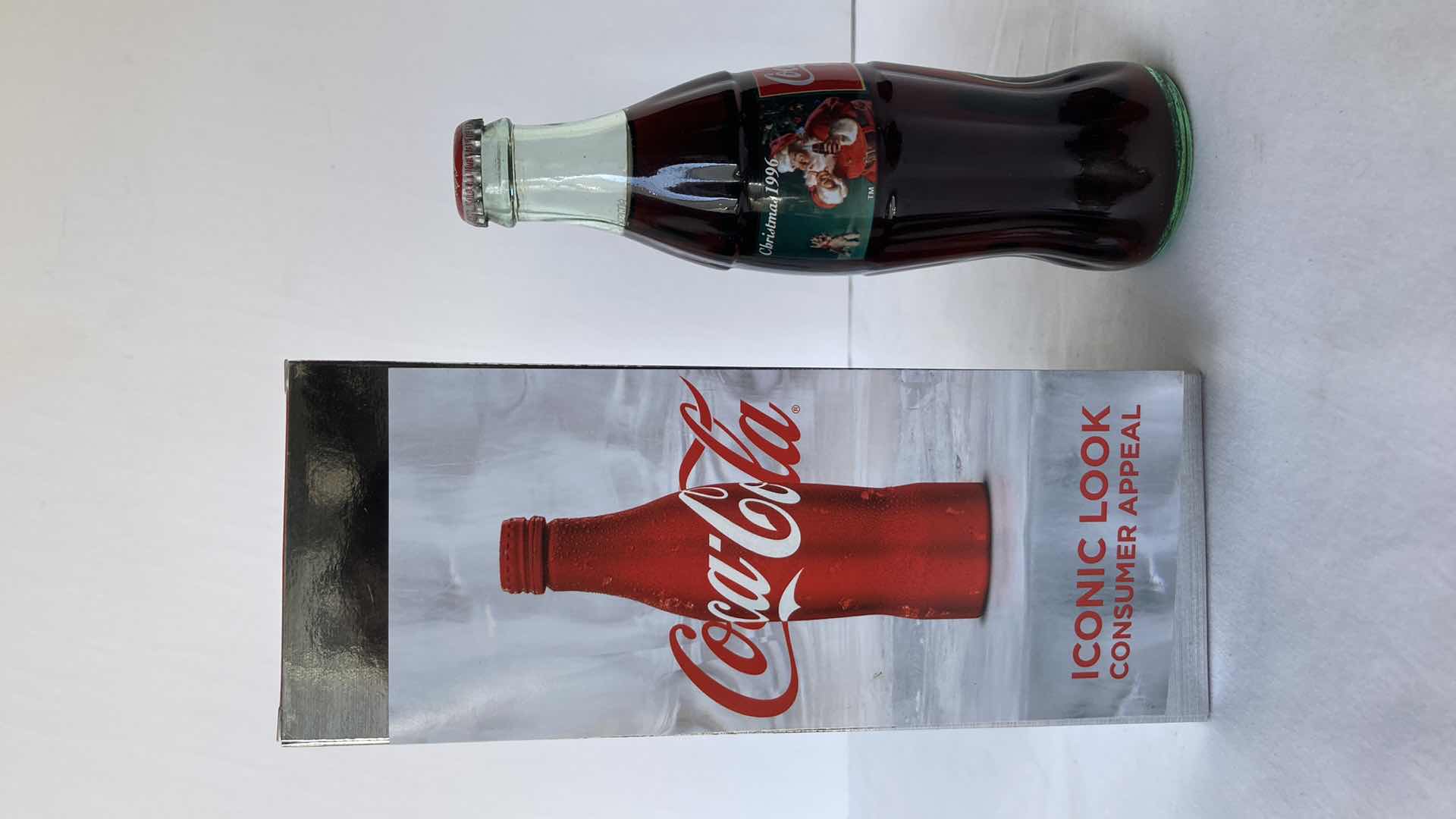 Photo 1 of NEW COCA-COLA RED ALUMINUM 8.5OZ FULL BOTTLE & COCA-COLA CHRISTMAS 1996 8OZ FULL BOTTLE