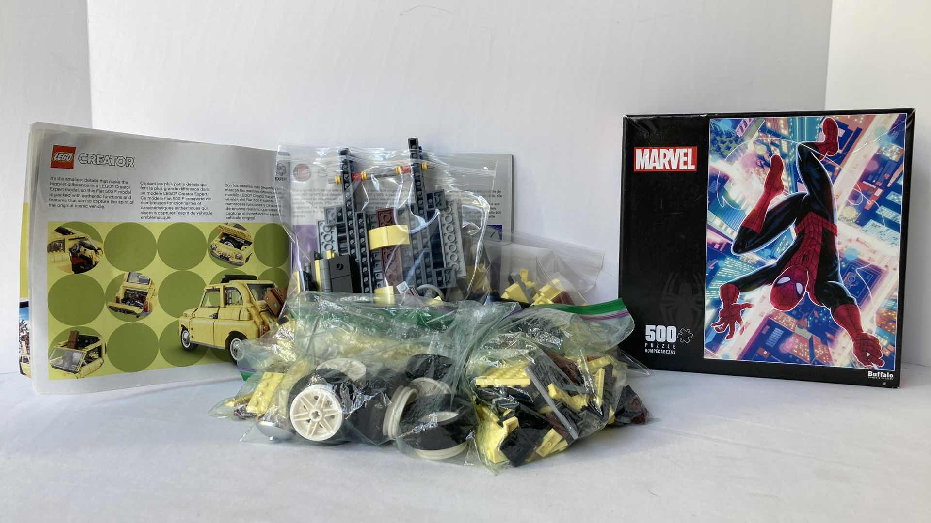 Photo 1 of LEGO CREATOR YELLOW FIAT 500 F MODEL & MARVEL SPIDER-MAN 500PC PUZZLE