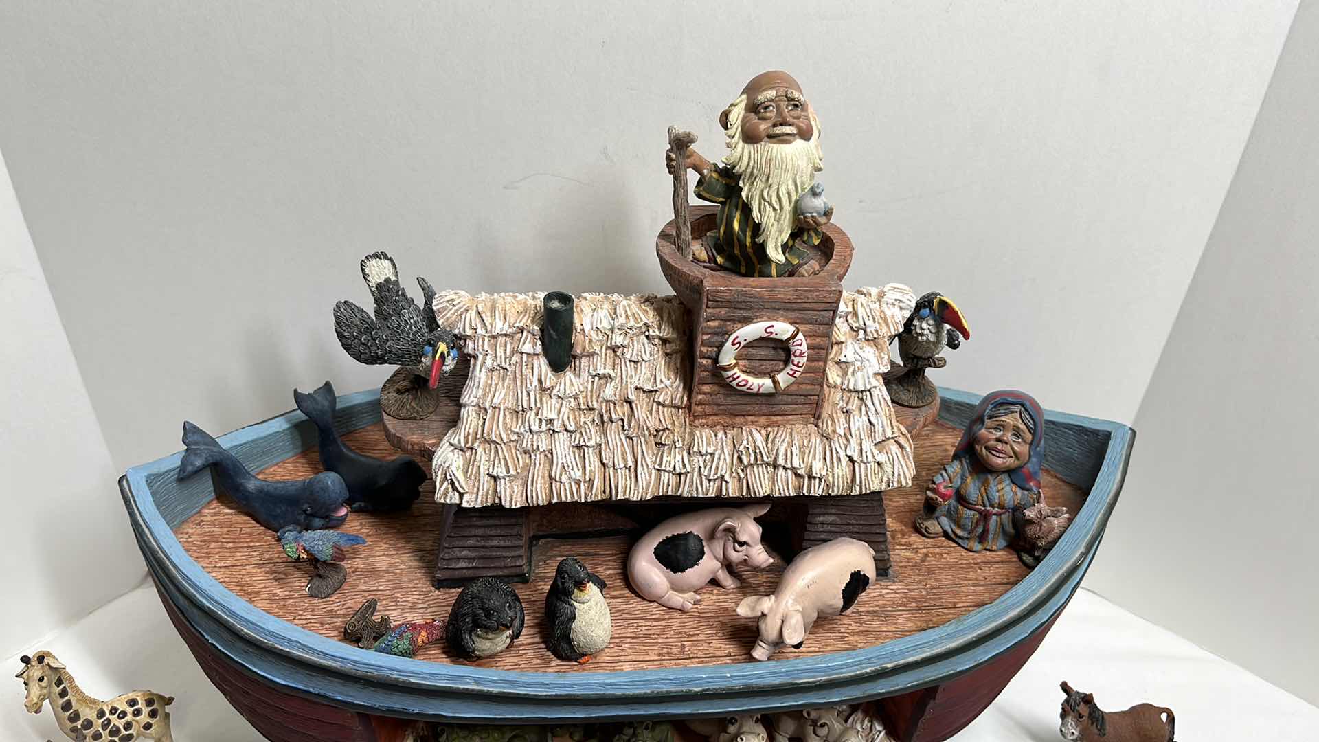 Photo 2 of NOAH’S ARK S.S. HOLY HERD COLLECTIBLES W NOAH & HIS WIFE & 34 ANIMAL FIGURINES 8.25” X 18.5” H12.5”