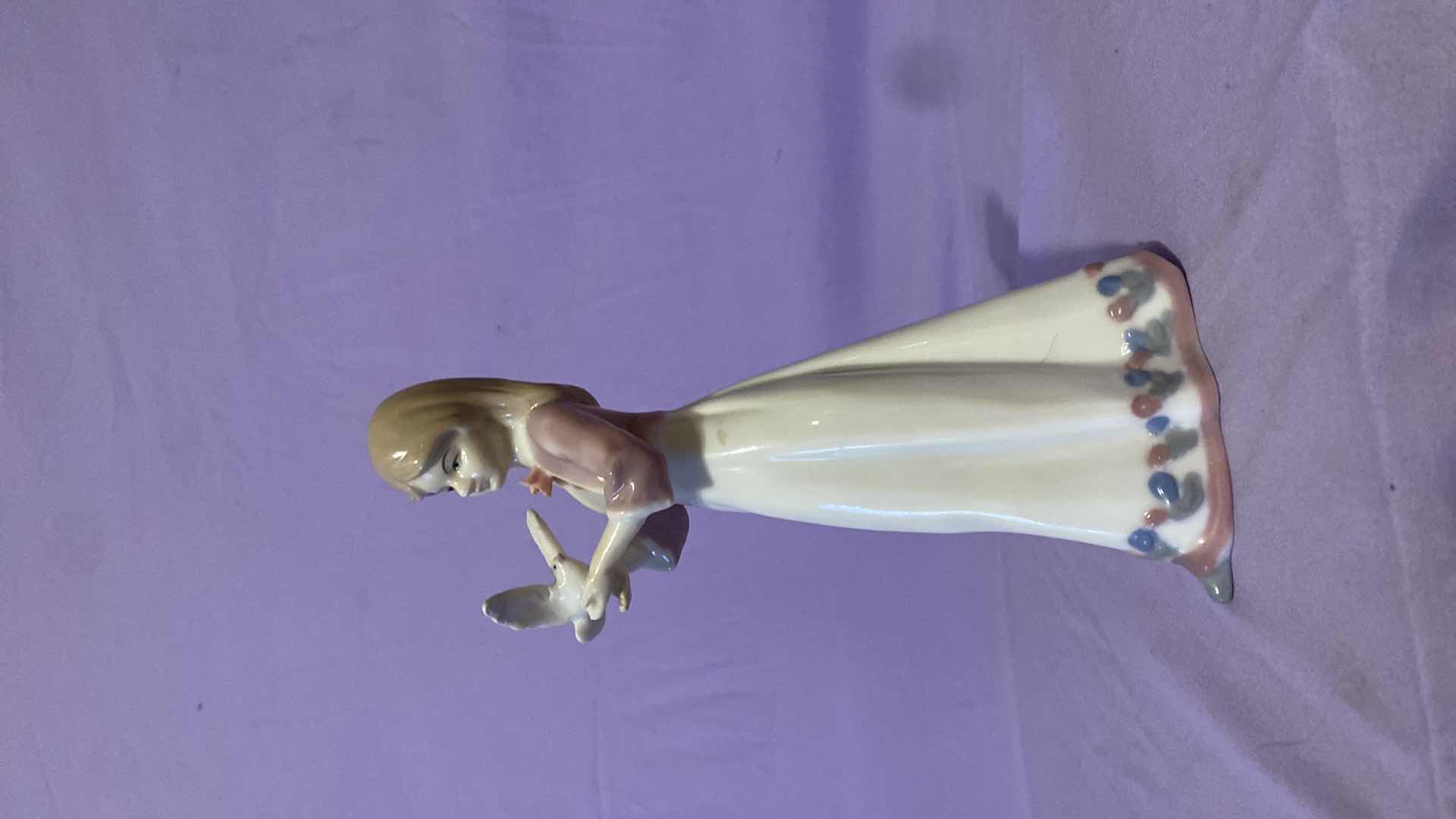 Photo 1 of CERAMIC GIRL HOLDING A DOVE