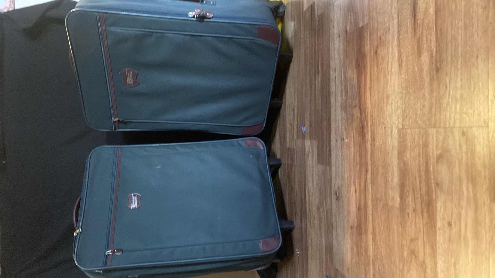 Photo 1 of 2 AMERICAN TOURISTS SUITCASES