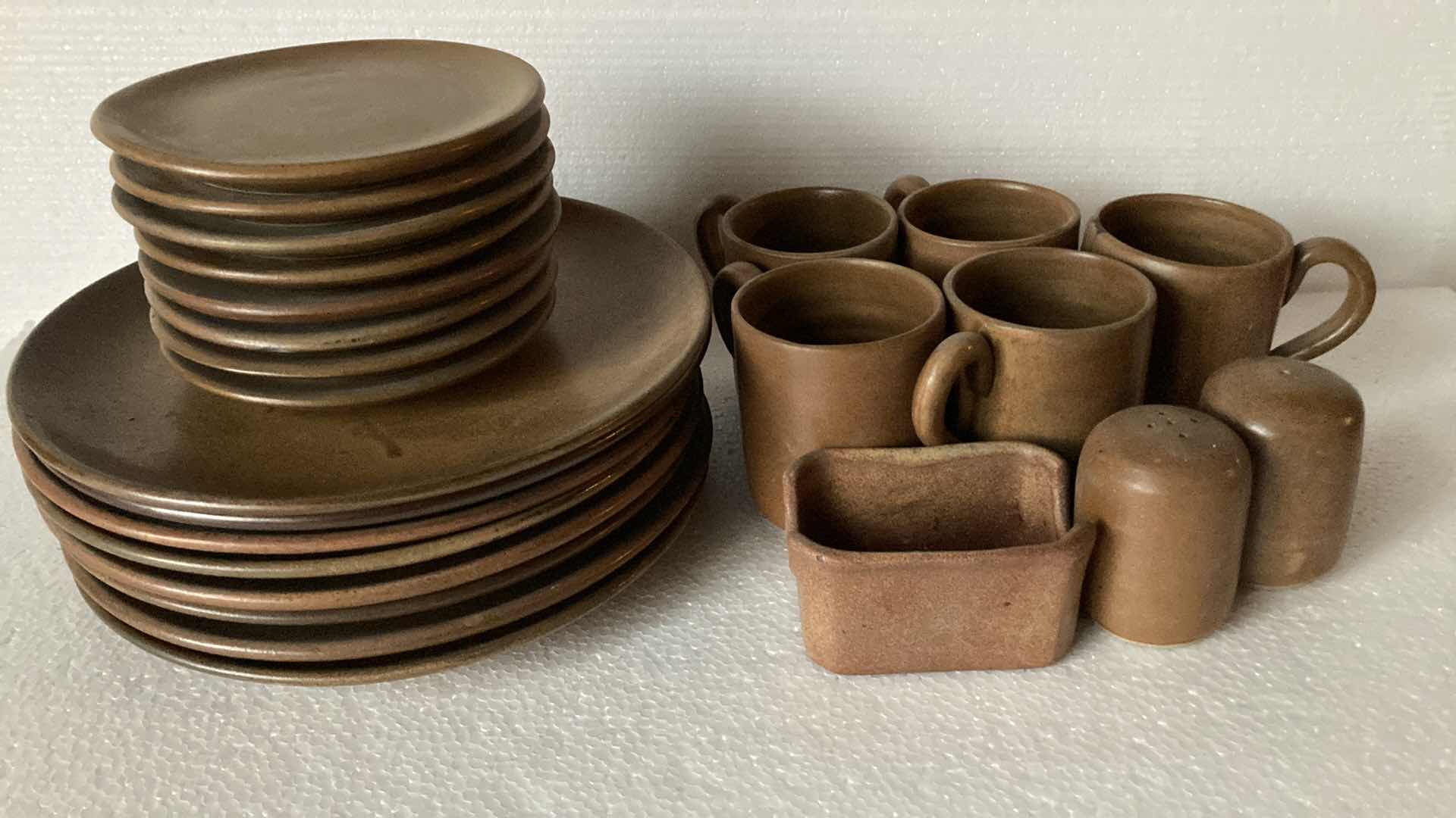 Photo 1 of MEXICAN CLAY PLATE AND DINING SET (24)