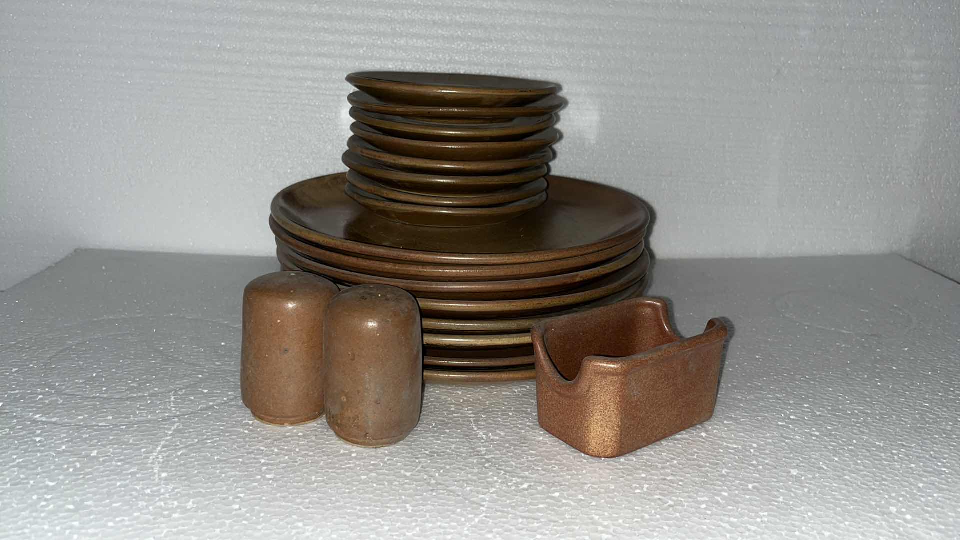 Photo 1 of MEXICAN CLAY PLATE SET W SALT & PEPPER SHAKES AND CONDIMENT HOLDER (19)