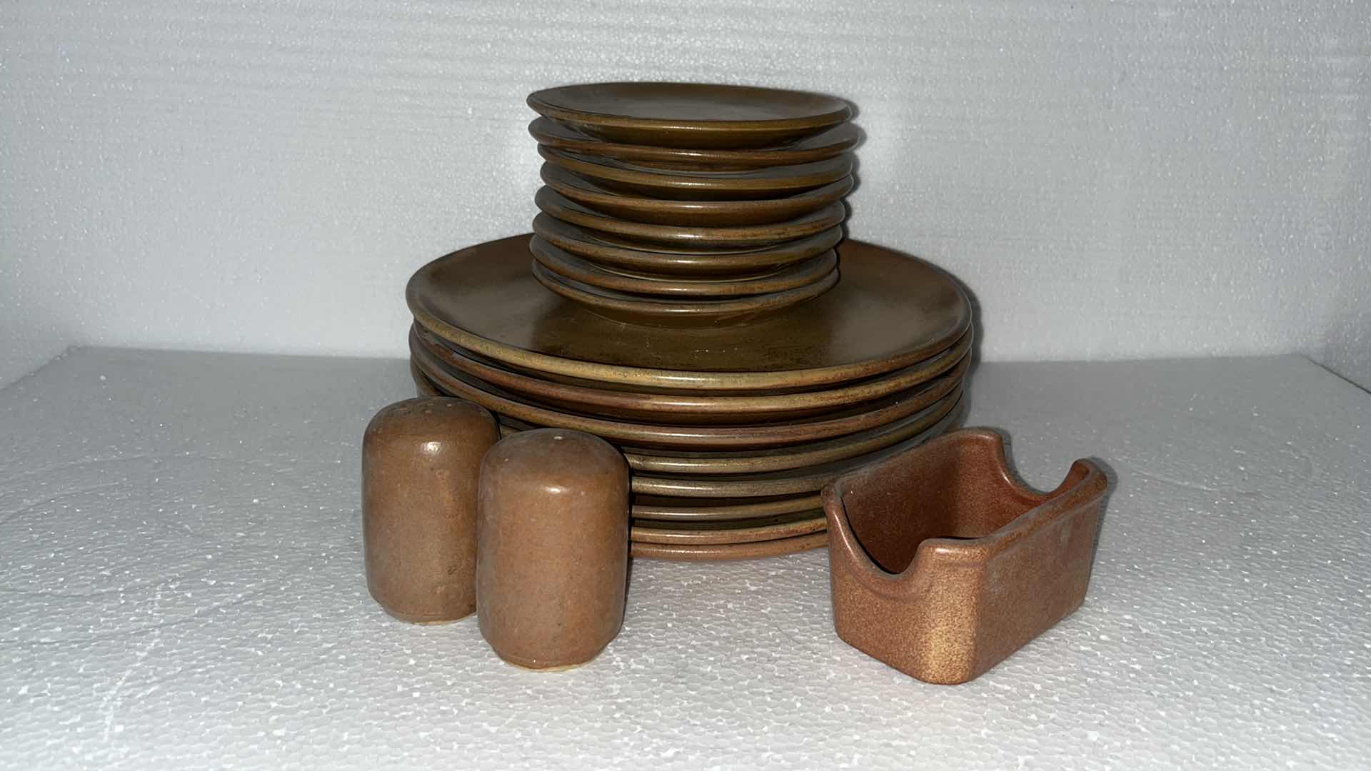 Photo 1 of MEXICAN CLAY PLATE SET W SALT & PEPPER SHAKES AND CONDIMENT HOLDER (19)