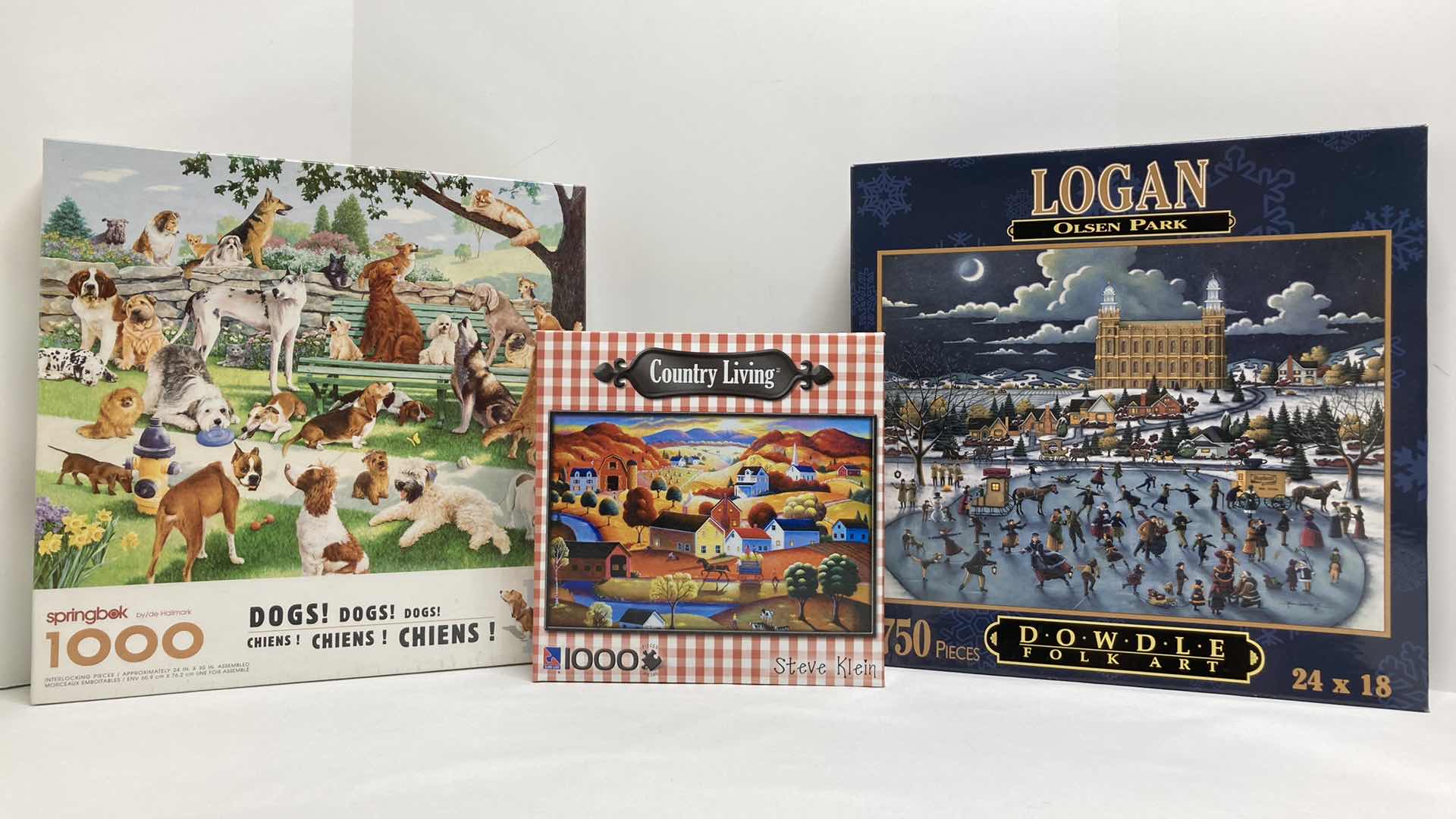Photo 1 of NEW SPRINGBOK DOGS PUZZLE & COUNTRY LIVING STEVE KLEIN PUZZLE W LOGAN OLSEN PARK PUZZLE
