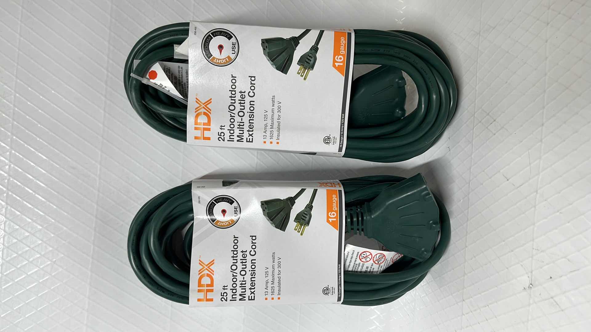 Photo 1 of NEW 2- HDX 25 FT INDOOR/OUTDOOR MULTI-OUTLET EXTENSION CORD, 16 GAUGE