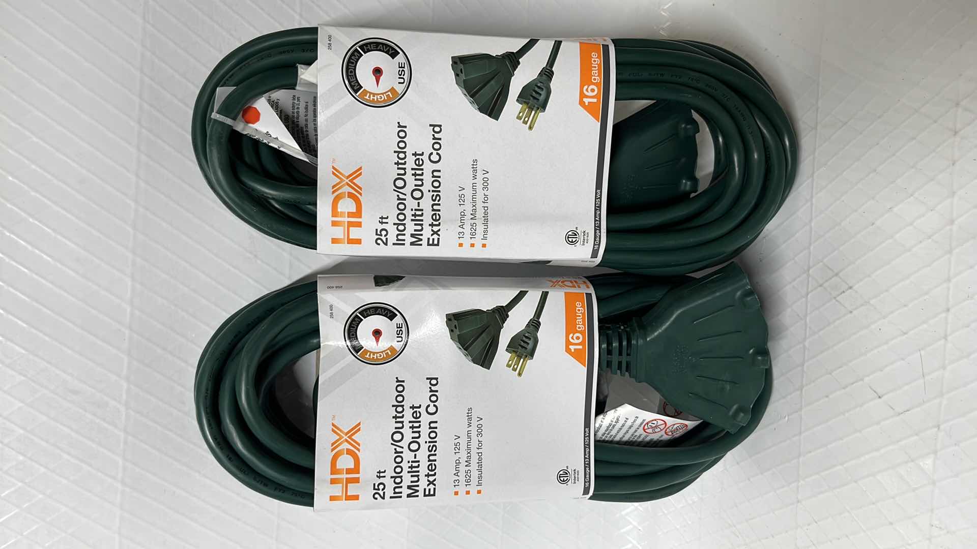 Photo 1 of NEW 2- HDX 25 FT INDOOR/OUTDOOR MULTI-OUTLET EXTENSION CORD, 16 GAUGE