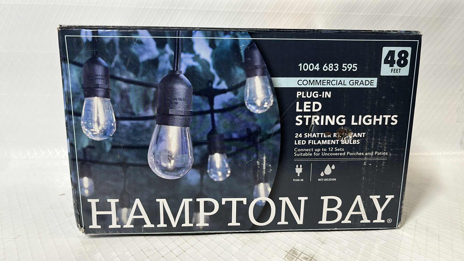 Photo 1 of HAMPTON BAY 48 FT COMMERCIAL GRADE LED PLUG-IN STRING LIGHTS, W 24 SHATTER RESISTANT FILAMENT BULBS (1004683595)