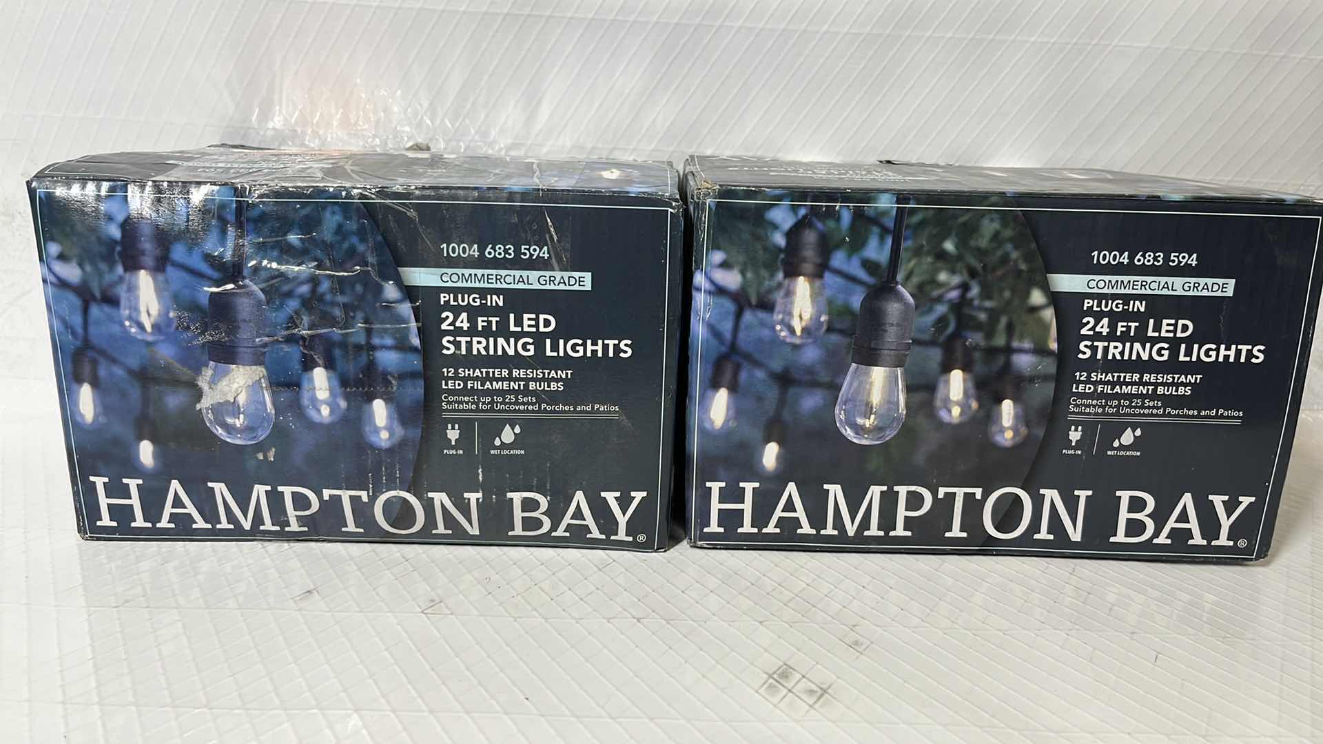 Photo 1 of 2- HAMPTON BAY 24 FT COMMERCIAL GRADE LED PLUG-IN STRING LIGHTS W 12 SHATTER RESISTANT FILAMENT BULBS (1004683594)