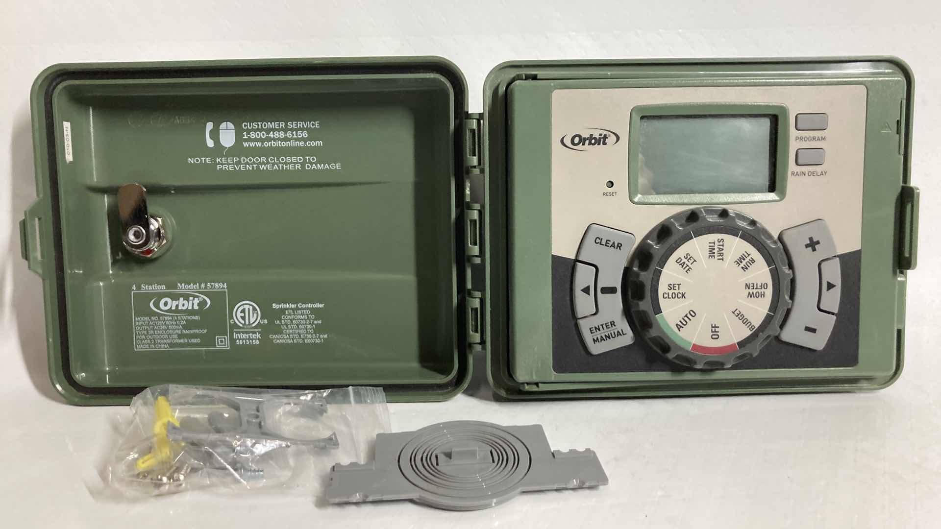 Photo 1 of NEW ORBIT EASY SET LOGIC 4 STATION SPRINKLER TIMER MODEL 57894