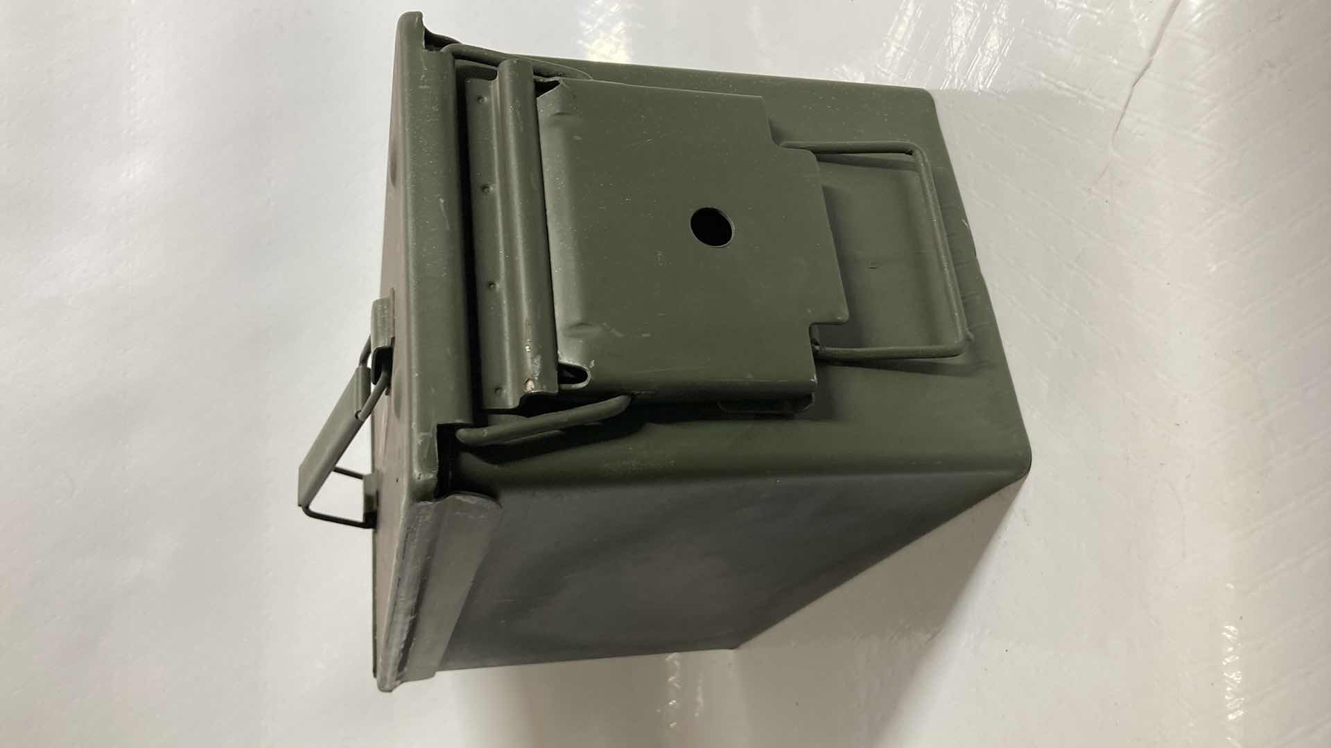 Photo 2 of STEEL AMMO STORAGE BOX W 45CAL SPENT BRASS CASINGS 6” X 12” H7”